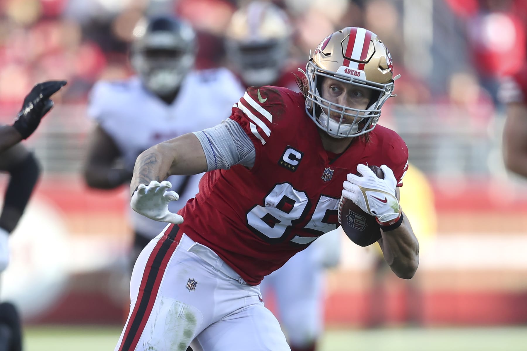 San Francisco 49ers tight end George Kittle (85) runs against the Atlanta Falcons during the second half of an NFL football game in Santa Clara, Calif., Sunday, Dec. 19, 2021. (AP Photo/Jed Jacobsohn)
