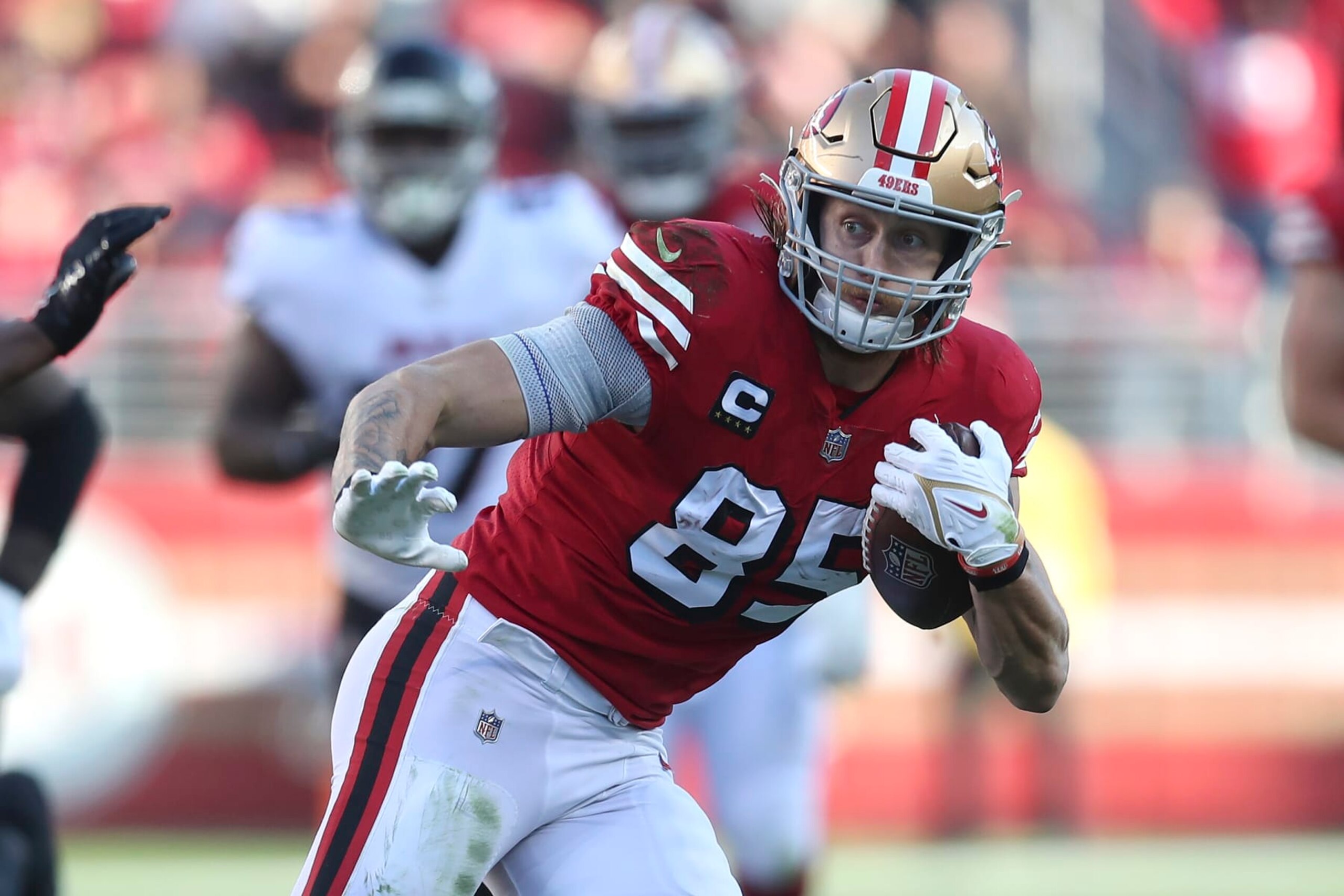 San Francisco 49ers tight end George Kittle (85) runs against the Atlanta Falcons during the second half of an NFL football game in Santa Clara, Calif., Sunday, Dec. 19, 2021. (AP Photo/Jed Jacobsohn)