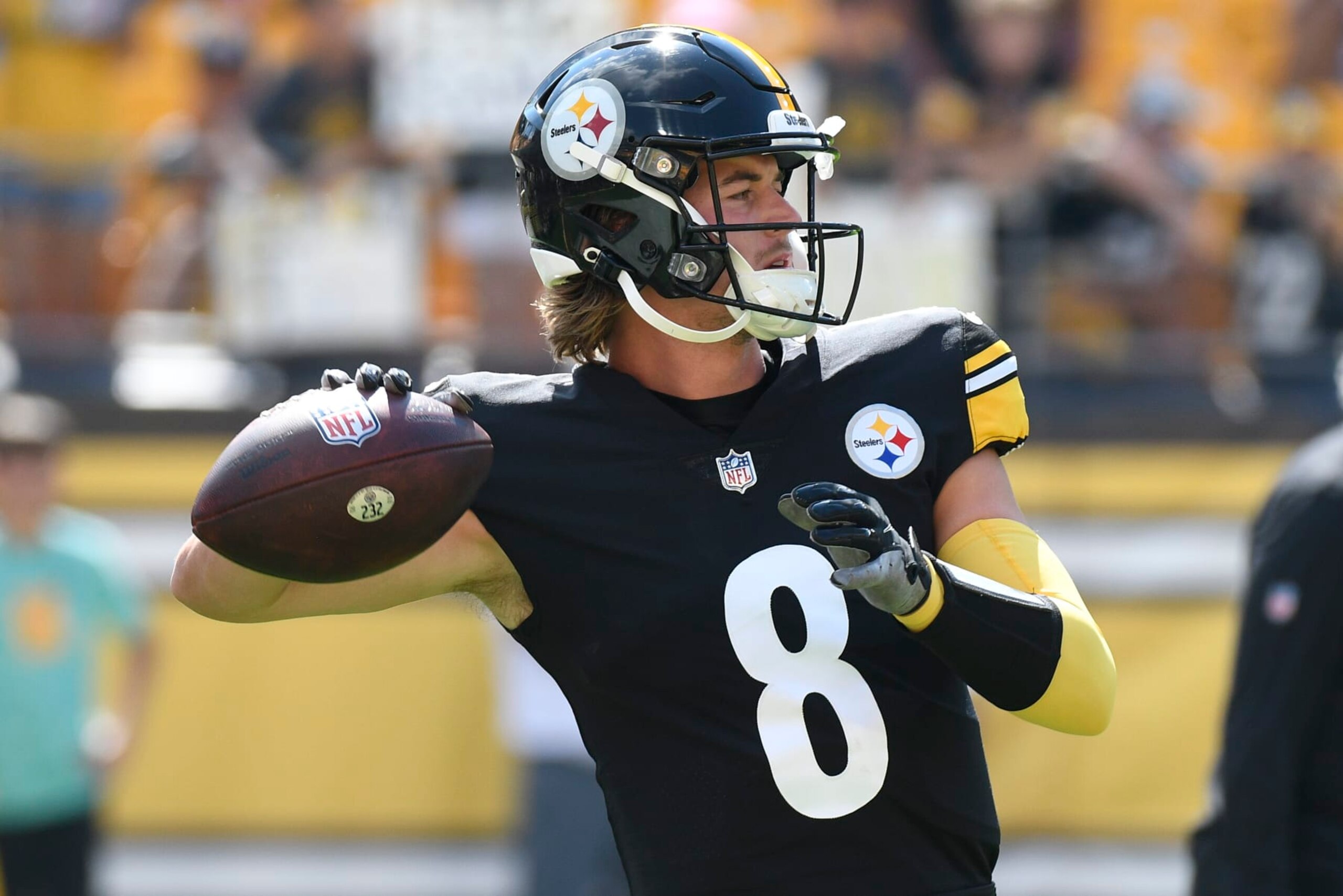 Pittsburgh Steelers quarterback Kenny Pickett (8) warms up before an NFL preseason football game against the Detroit Lions, Sunday, Aug. 28, 2022, in Pittsburgh. (AP Photo/Don Wright)