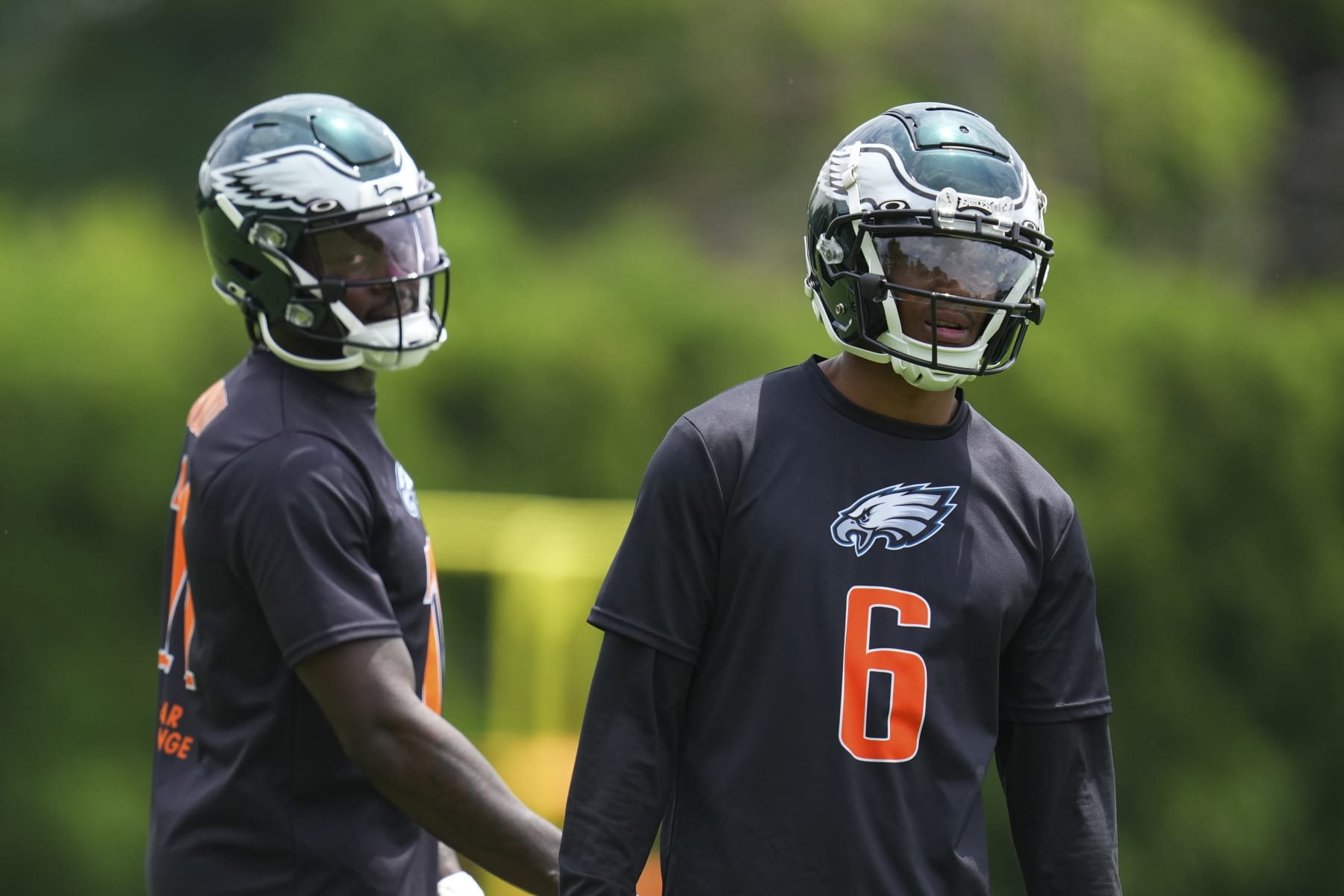 PHILADELPHIA, PA - JUNE 03: A.J. Brown #11 and DeVonta Smith #6 of the Philadelphia Eagles look on during OTAs at the NovaCare Complex on June 3, 2022 in Philadelphia, Pennsylvania. (Photo by Mitchell Leff/Getty Images)