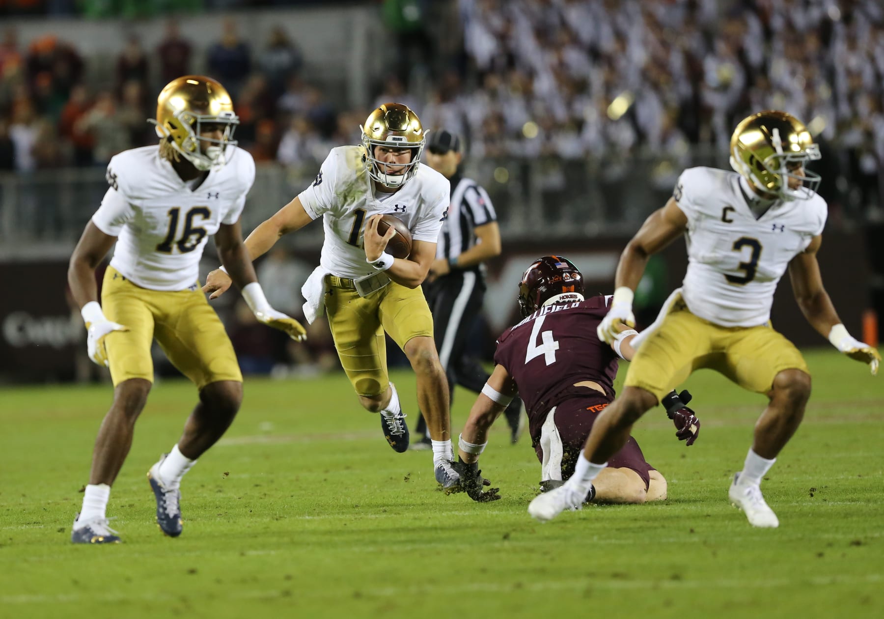 BLACKSBURG, VA - OCTOBER 09: Notre Dame Fighting Irish quarterback Tyler Buchner (12) rushes up field during a game between the Notre Dame Fighting Irish and the Virginia Tech Hokies on October 09, 2021, at Lane Stadium in Blacksburg, VA. (Photo by Lee Coleman/Icon Sportswire via Getty Images)