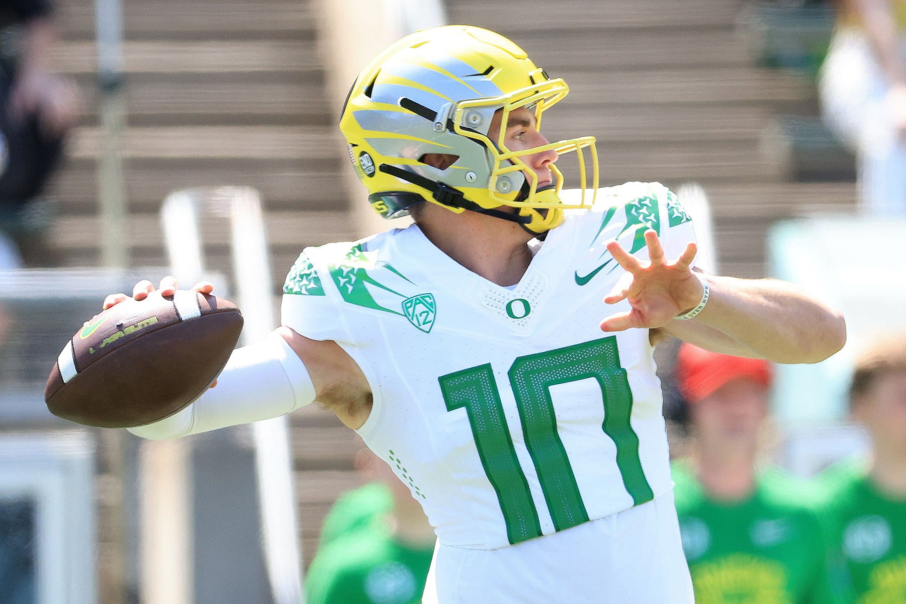 EUGENE, OREGON - APRIL 23: Bo Nix #10 of Team Yellow throws a pass against Team Green during the first quarter of the Oregon Spring Game at Autzen Stadium on April 23, 2022 in Eugene, Oregon. (Photo by Abbie Parr/Getty Images)