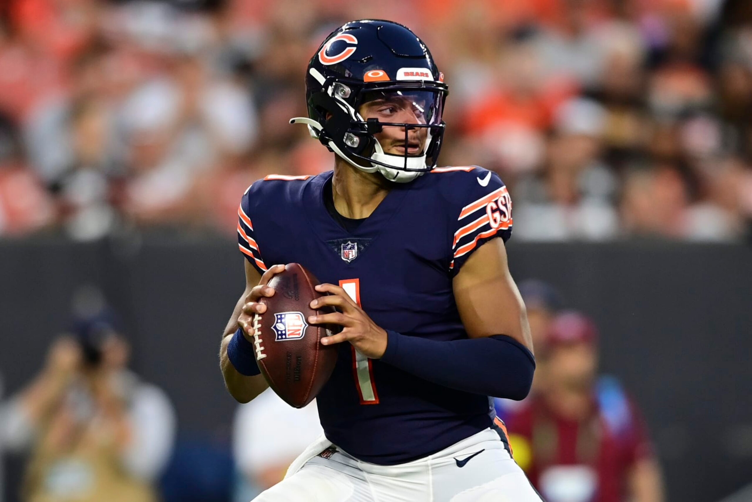 Chicago Bears quarterback Justin Fields (1) looks to pass against the Cleveland Browns during the first half of an NFL preseason football game, Saturday, Aug. 27, 2022, in Cleveland. (AP Photo/David Dermer) Chicago Bears quarterback Justin Fields (1) looks to pass against the Cleveland Browns during the first half of an NFL preseason football game, Saturday, Aug. 27, 2022, in Cleveland. (AP Photo/David Dermer)
