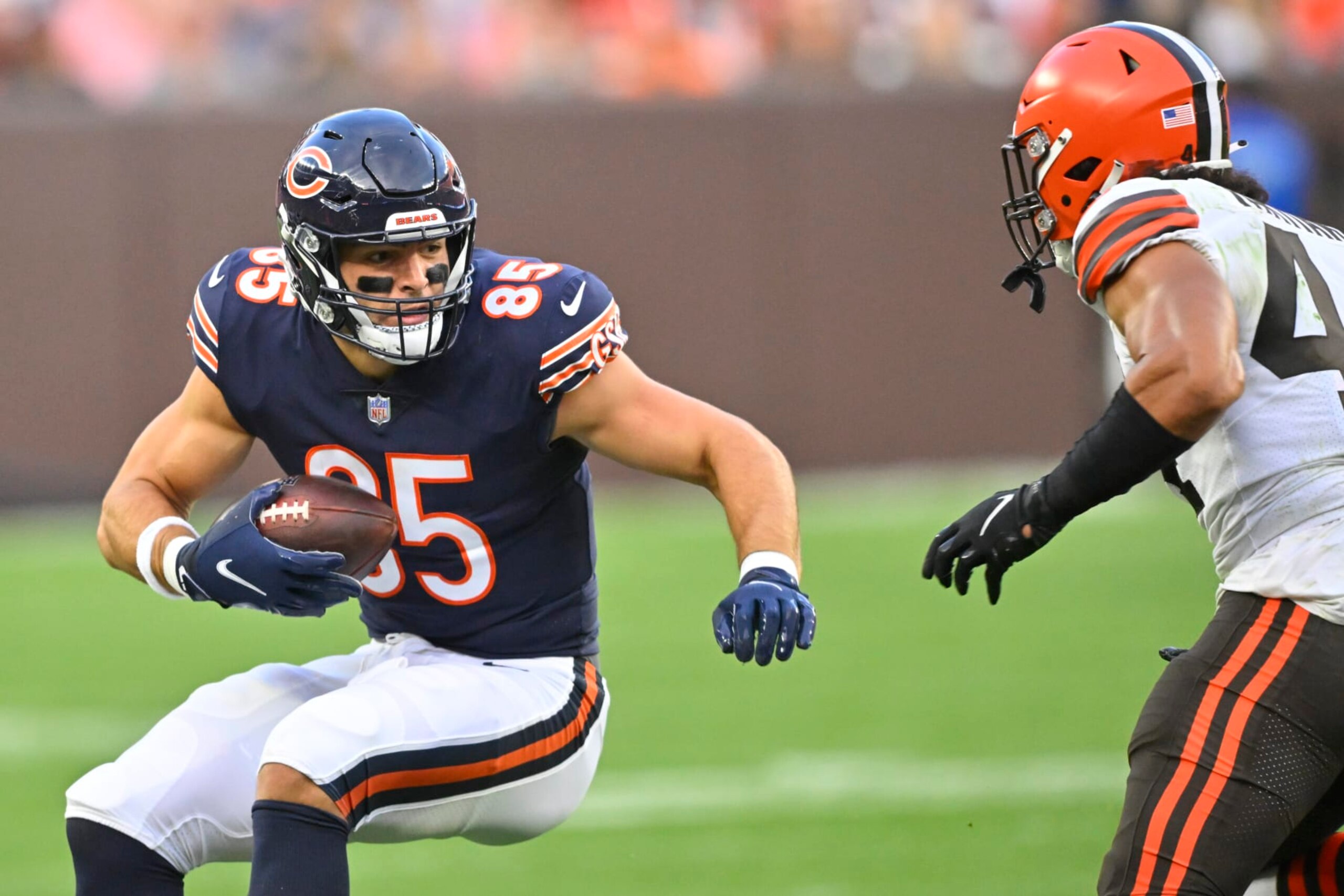 Chicago Bears tight end Cole Kmet (85) tries to evade Cleveland Browns linebacker Sione Takitaki (44) as he runs in the first half of an NFL preseason football game, Saturday, Aug. 27, 2022, in Cleveland. (AP Photo/David Richard) Chicago Bears tight end Cole Kmet (85) tries to evade Cleveland Browns linebacker Sione Takitaki (44) as he runs in the first half of an NFL preseason football game, Saturday, Aug. 27, 2022, in Cleveland. (AP Photo/David Richard)