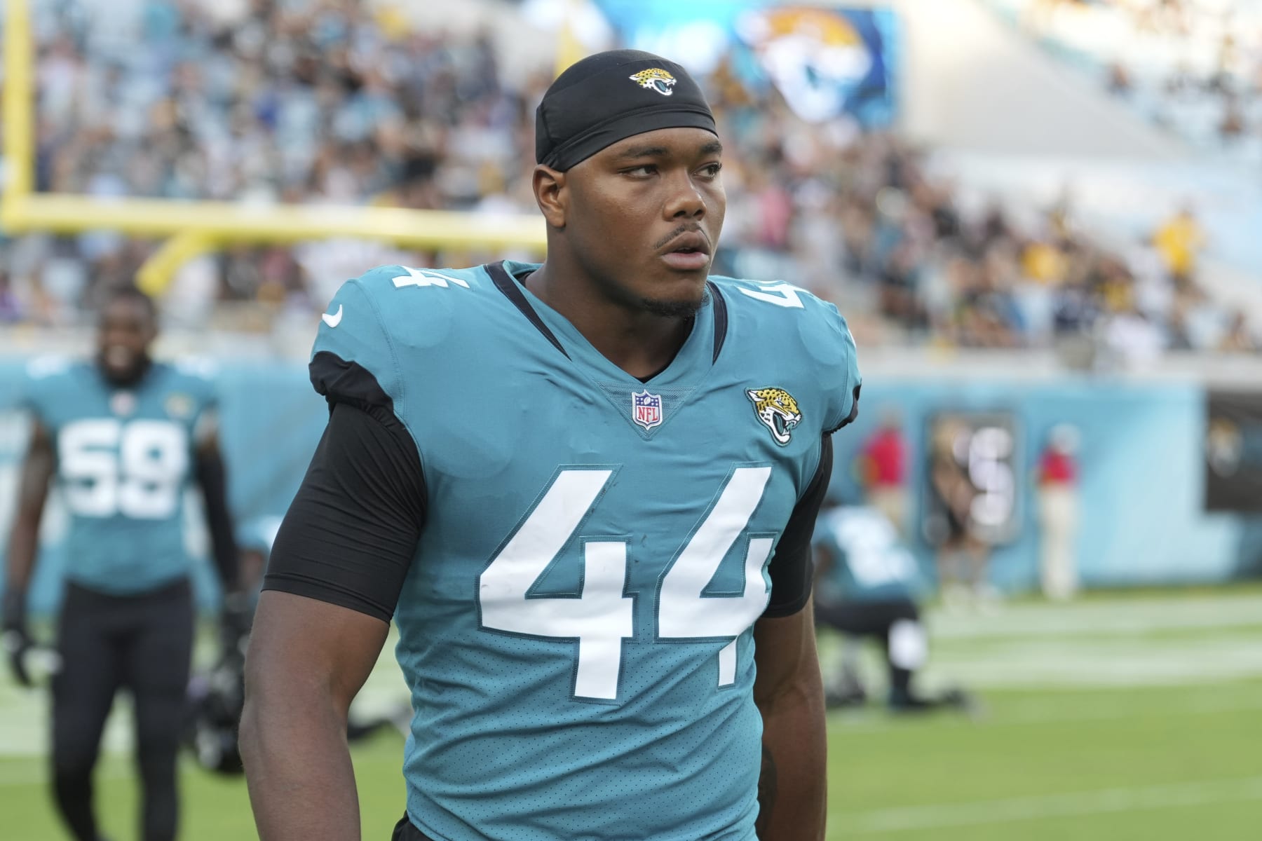 Jacksonville Jaguars linebacker Travon Walker (44) walks to the team bench before an NFL football game against the Pittsburgh Steelers, Saturday, August 20, 2022 in Jacksonville, FL. The Steelers defeat the Jaguars 16-15. (Peter Joneleit via AP)