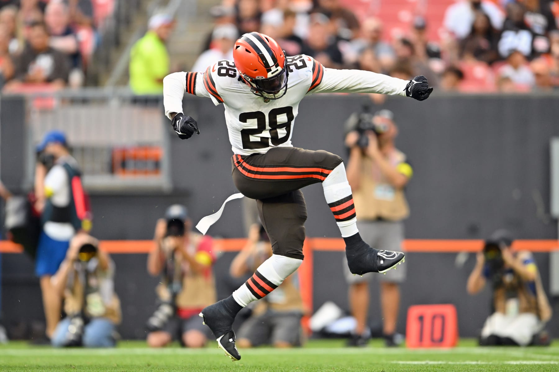 CLEVELAND, OHIO - AUGUST 27: Linebacker Jeremiah Owusu-Koramoah #28 of the Cleveland Browns celebrates after making a tackle during the first quarter of a preseason game at FirstEnergy Stadium on August 27, 2022 in Cleveland, Ohio. (Photo by Jason Miller/Getty Images)