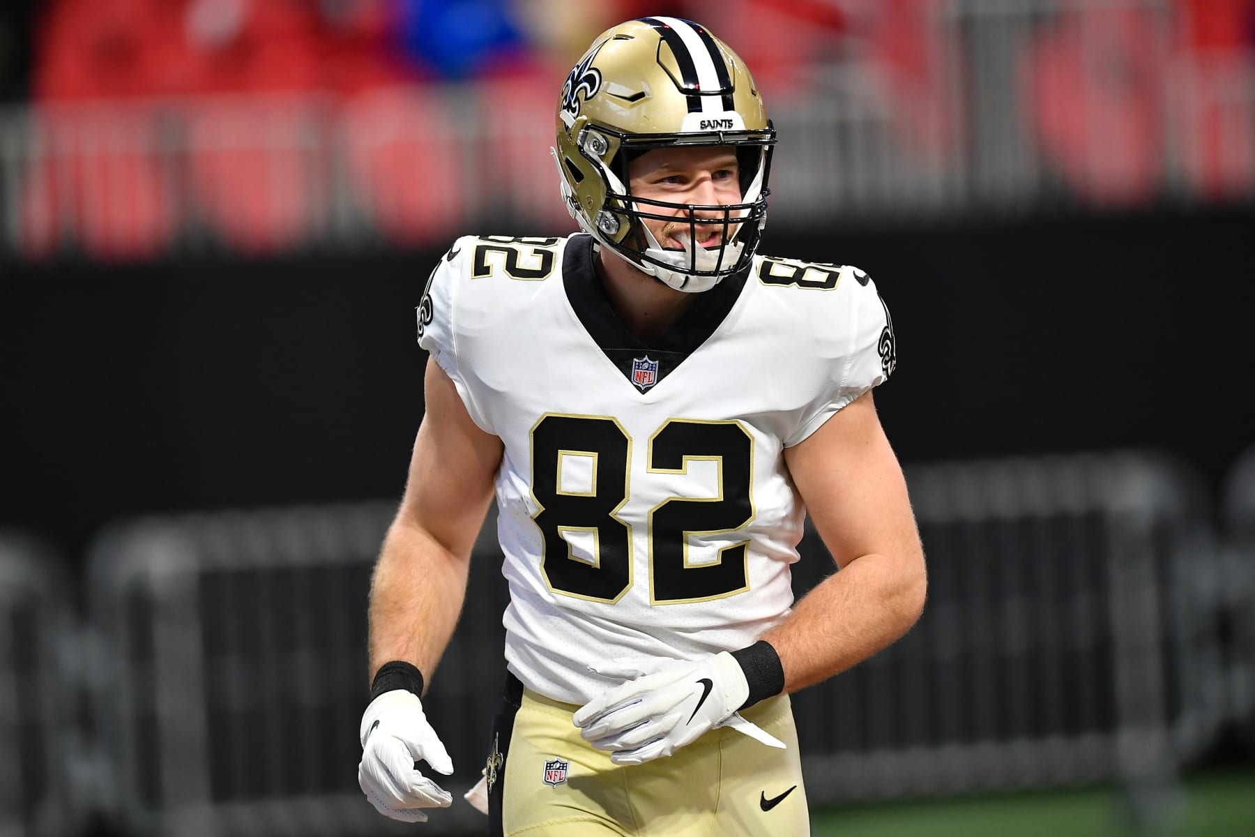 ATLANTA, GA  JANUARY 09:  New Orleans tight end Adam Trautman (82) warms up prior to the start of the NFL game between the New Orleans Saints and the Atlanta Falcons on January 9th, 2022 at Mercedes-Benz Stadium in Atlanta, GA.  (Photo by Rich von Biberstein/Icon Sportswire via Getty Images)