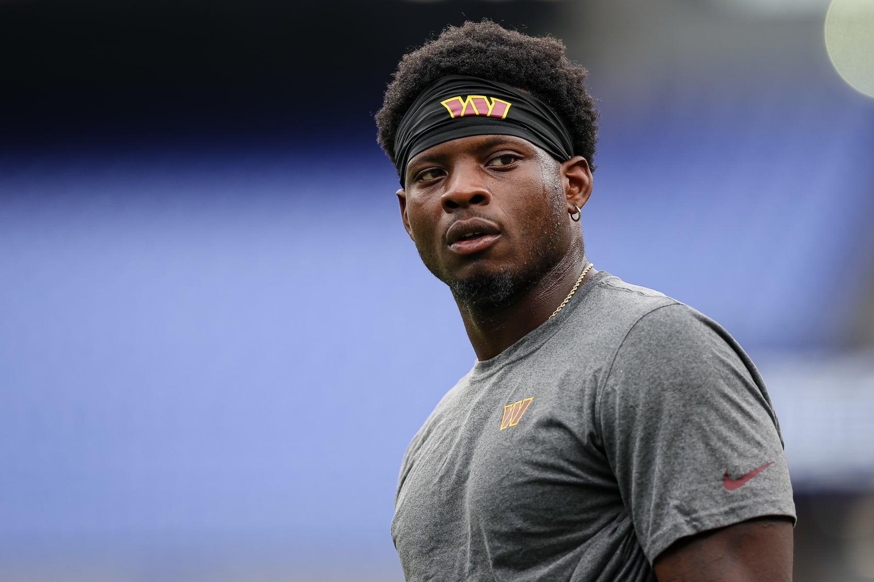 BALTIMORE, MD - AUGUST 27: Brian Robinson #8 of the Washington Commanders warms up before the preseason game against the Baltimore Ravens at M&T Bank Stadium on August 27, 2022 in Baltimore, Maryland. (Photo by Scott Taetsch/Getty Images)