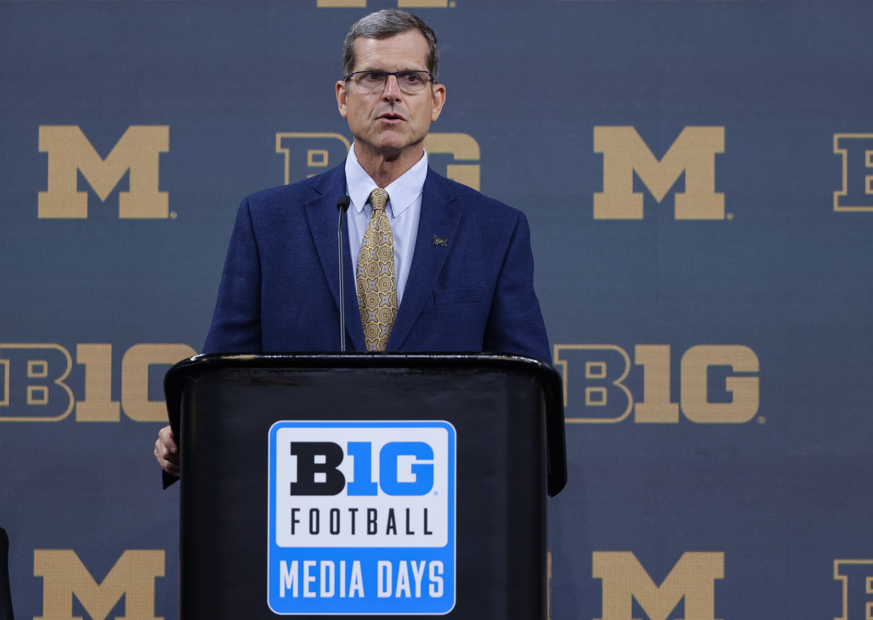 INDIANAPOLIS, IN - JULY 26: Head coach Jim Harbaugh of the Michigan Wolverines speaks during the 2022 Big Ten Conference Football Media Days at Lucas Oil Stadium on July 26, 2022 in Indianapolis, Indiana. (Photo by Michael Hickey/Getty Images)