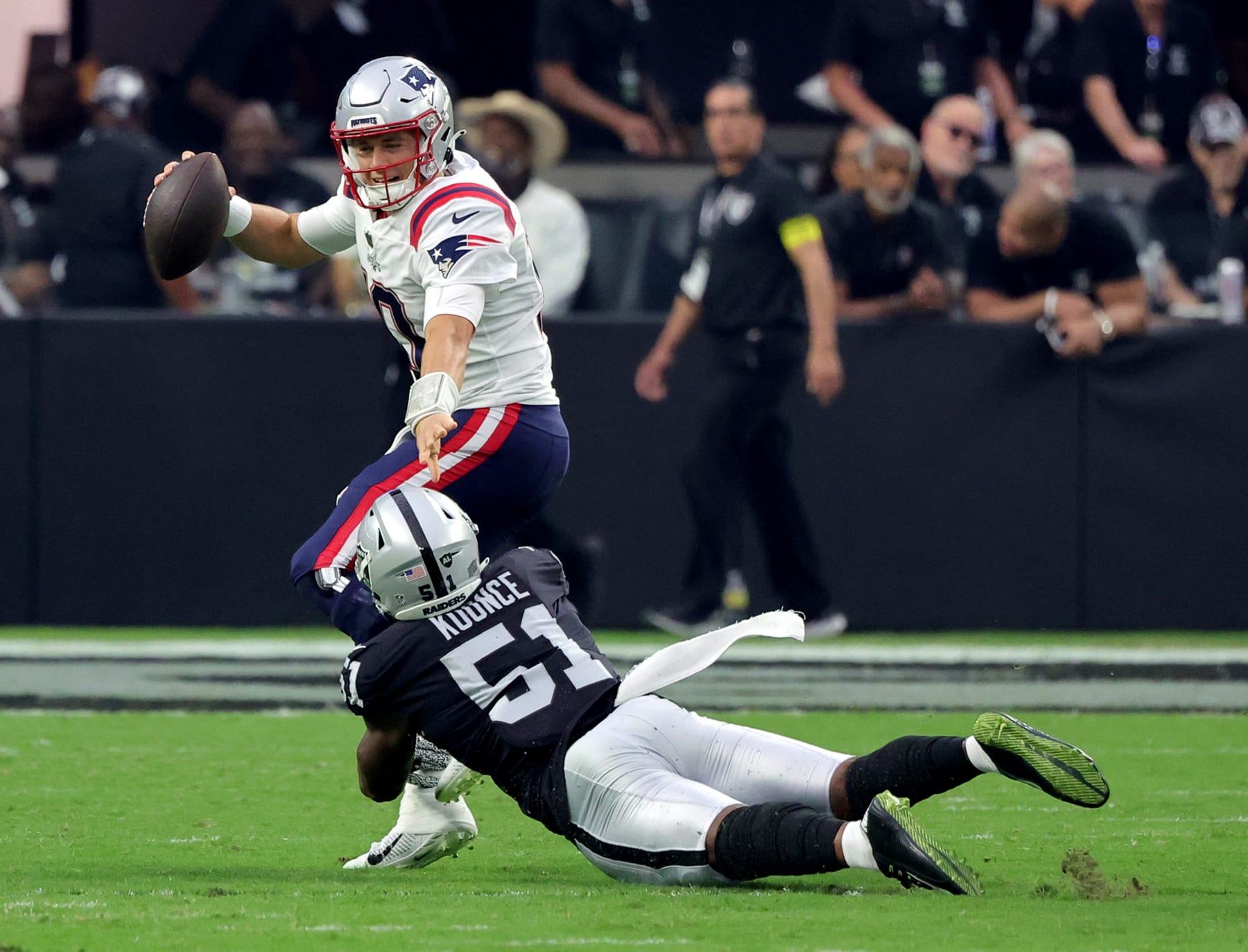 LAS VEGAS, NEVADA - AUGUST 26: Defensive end Malcolm Koonce #51 of the Las Vegas Raiders sacks quarterback Mac Jones #10 of the New England Patriots during their preseason game at Allegiant Stadium on August 26, 2022 in Las Vegas, Nevada. The Raiders defeated the Patriots 23-6. (Photo by Ethan Miller/Getty Images)