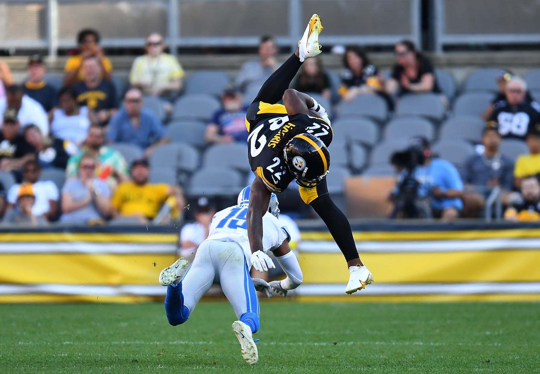 PITTSBURGH, PA - AUGUST 28:  Najee Harris #22 of the Pittsburgh Steelers attempts to hurdle over Saivion Smith #19 of the Detroit Lions during the second quarter at Acrisure Stadium on August 28, 2022 in Pittsburgh, Pennsylvania. (Photo by Joe Sargent/Getty Images)