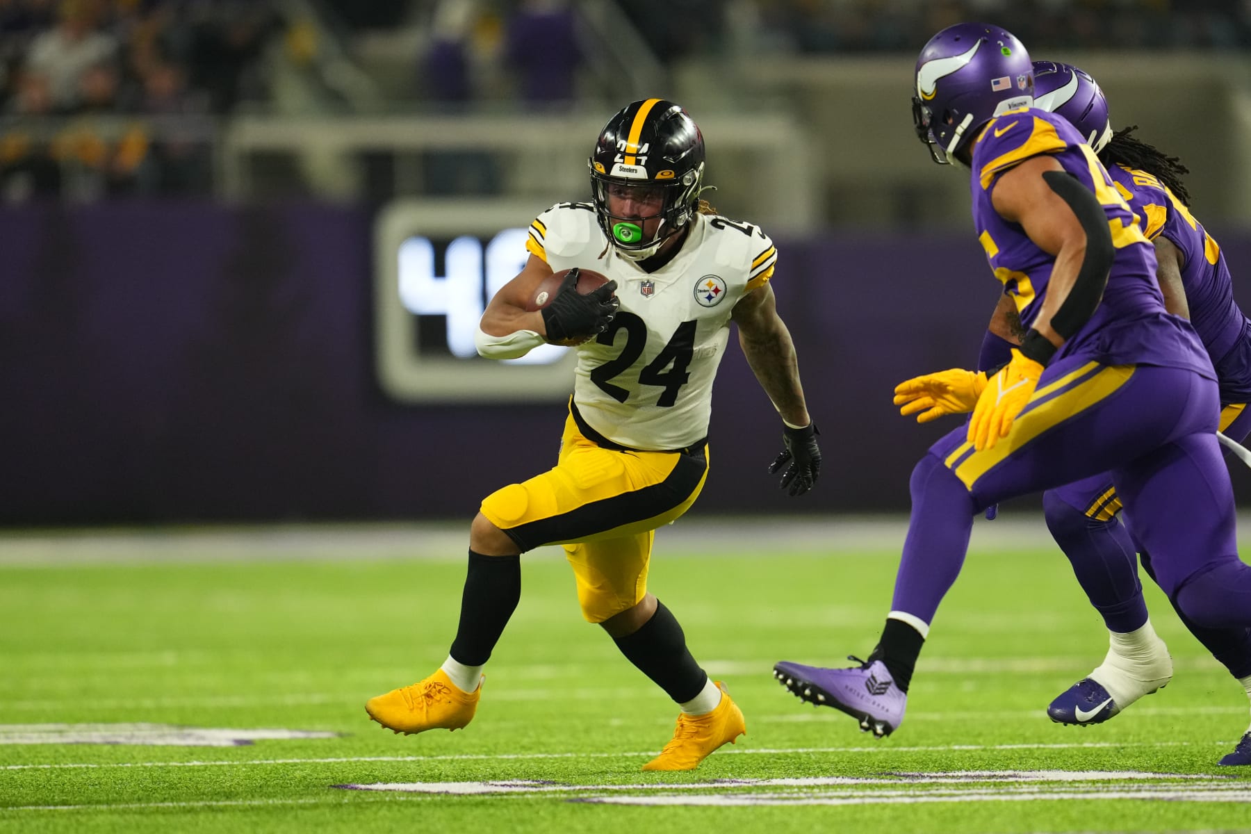 MINNEAPOLIS, MINNESOTA - DECEMBER 09: Benny Snell #24 of the Pittsburgh Steelers runs the ball against the Minnesota Vikings during an NFL game at U.S. Bank Stadium on December 09, 2021 in Minneapolis, Minnesota. (Photo by Cooper Neill/Getty Images)