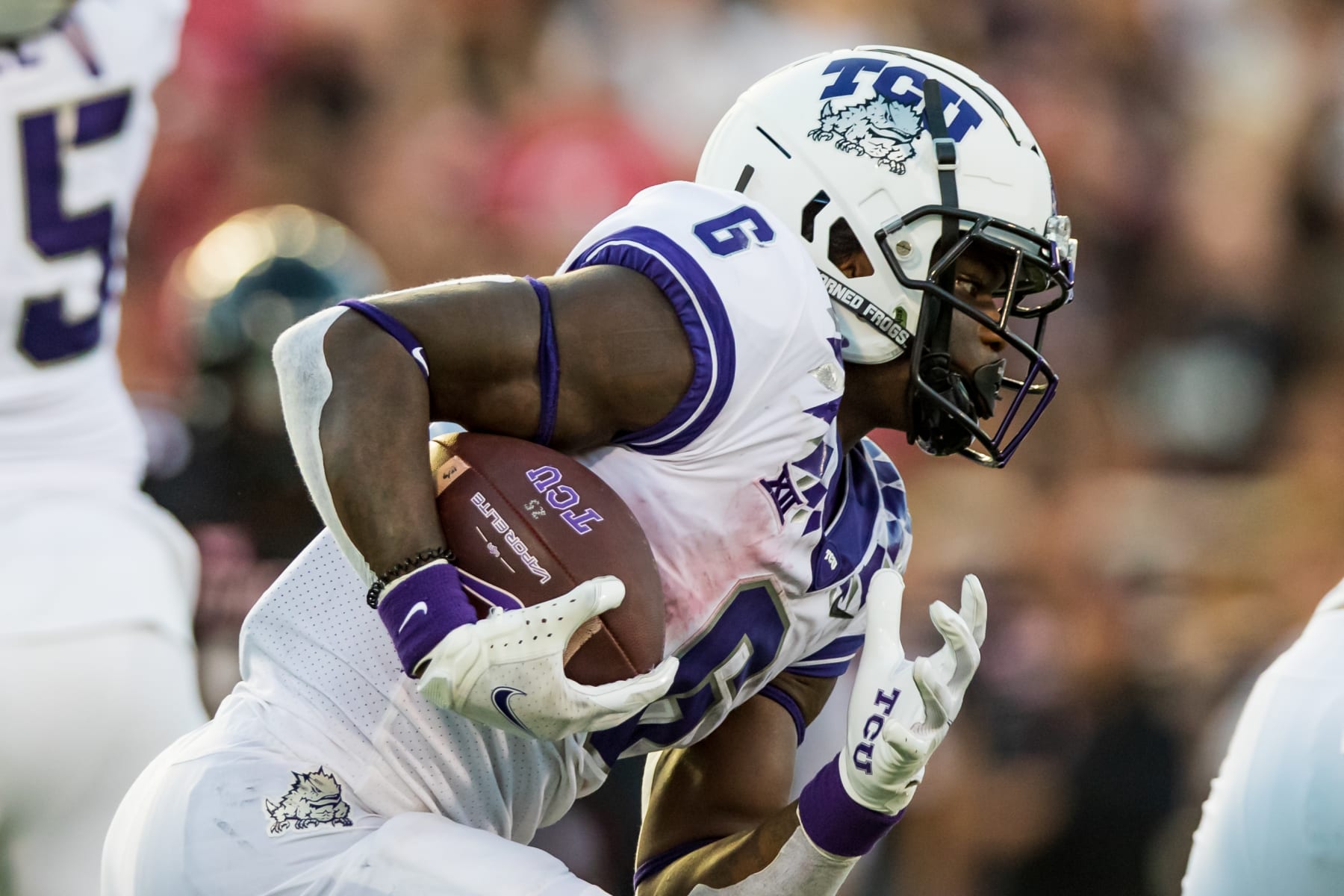 LUBBOCK, TEXAS - OCTOBER 09: Running back Zach Evans #6 of the TCU Horned Frogs runs the ball during the first half of the college football game against the Texas Tech Red Raiders at Jones AT&T Stadium on October 09, 2021 in Lubbock, Texas. (Photo by John E. Moore III/Getty Images)