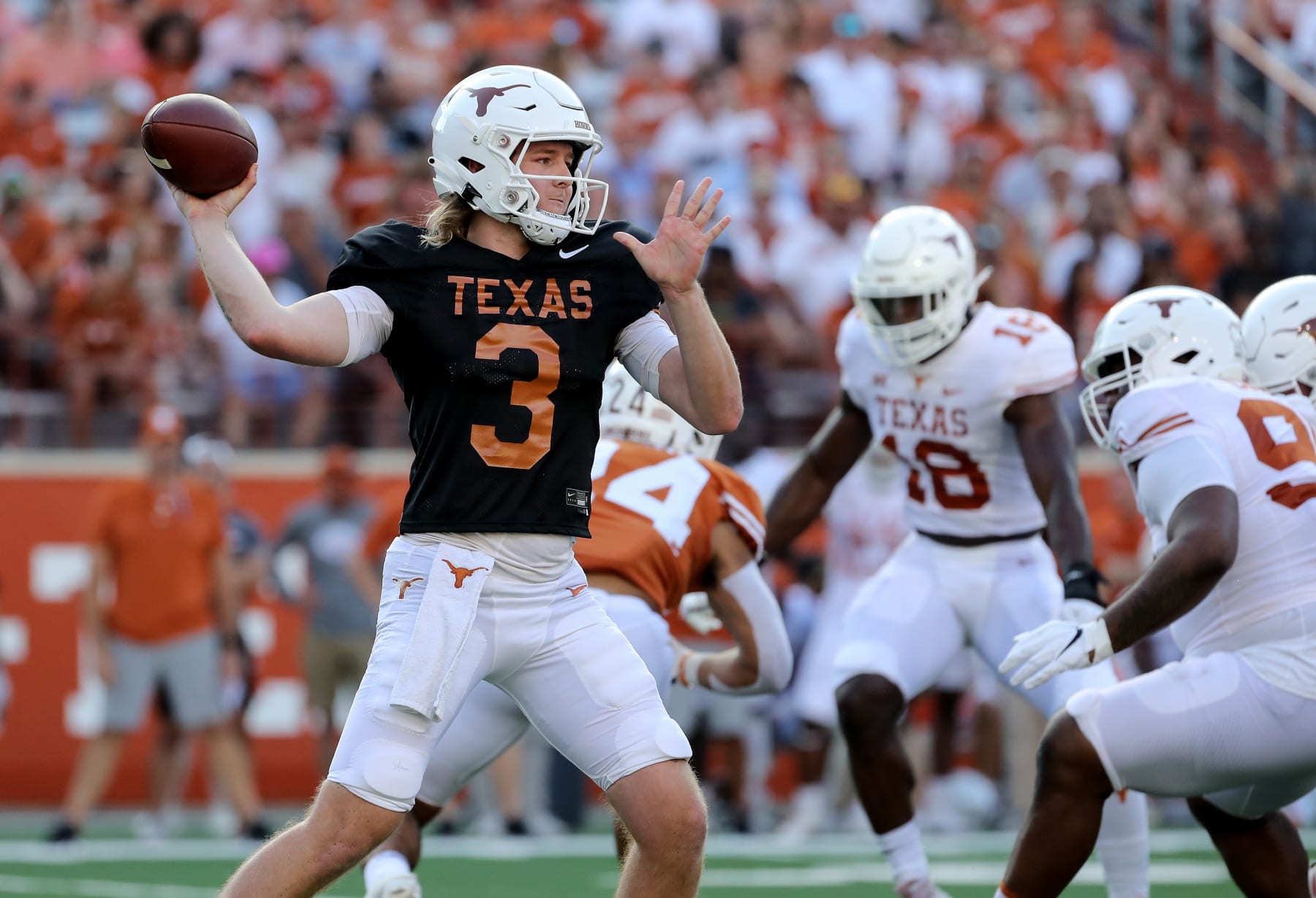 AUSTIN, TEXAS - APRIL 23: Quinn Ewers #3 of Texas Longhorns throws a pass during the Orange-White Spring Game at Darrell K Royal-Texas Memorial Stadium on April 23, 2022 in Austin, Texas. (Photo by Tim Warner/Getty Images)