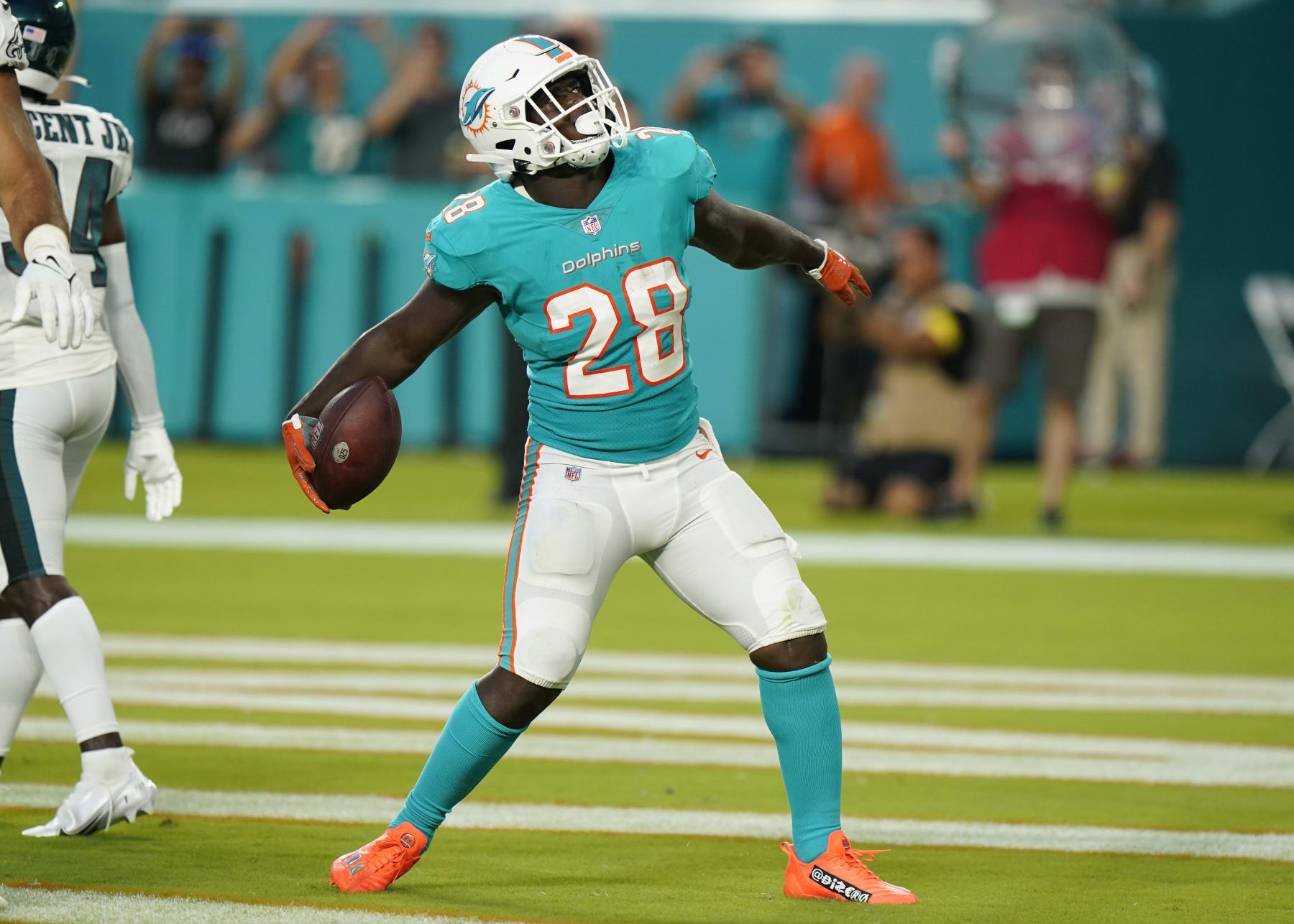 Miami Dolphins running back Sony Michel (28) celebrates a touchdown during the first half of a NFL preseason football game against the Philadelphia Eagles, Saturday, Aug. 27, 2022, in Miami Gardens, Fla. (AP Photo/Wilfredo Lee)