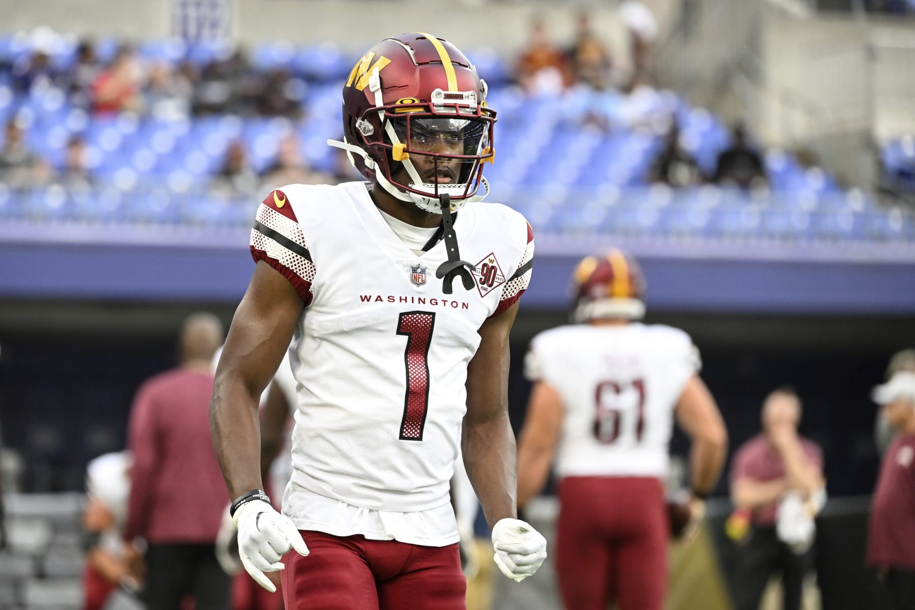 Washington Commanders wide receiver Jahan Dotson (1) looks on during pre-game warm-ups before a NFL preseason football game against the Baltimore Ravens, Saturday, Aug 27, 2022, in Baltimore. (AP Photo/Terrance Williams)