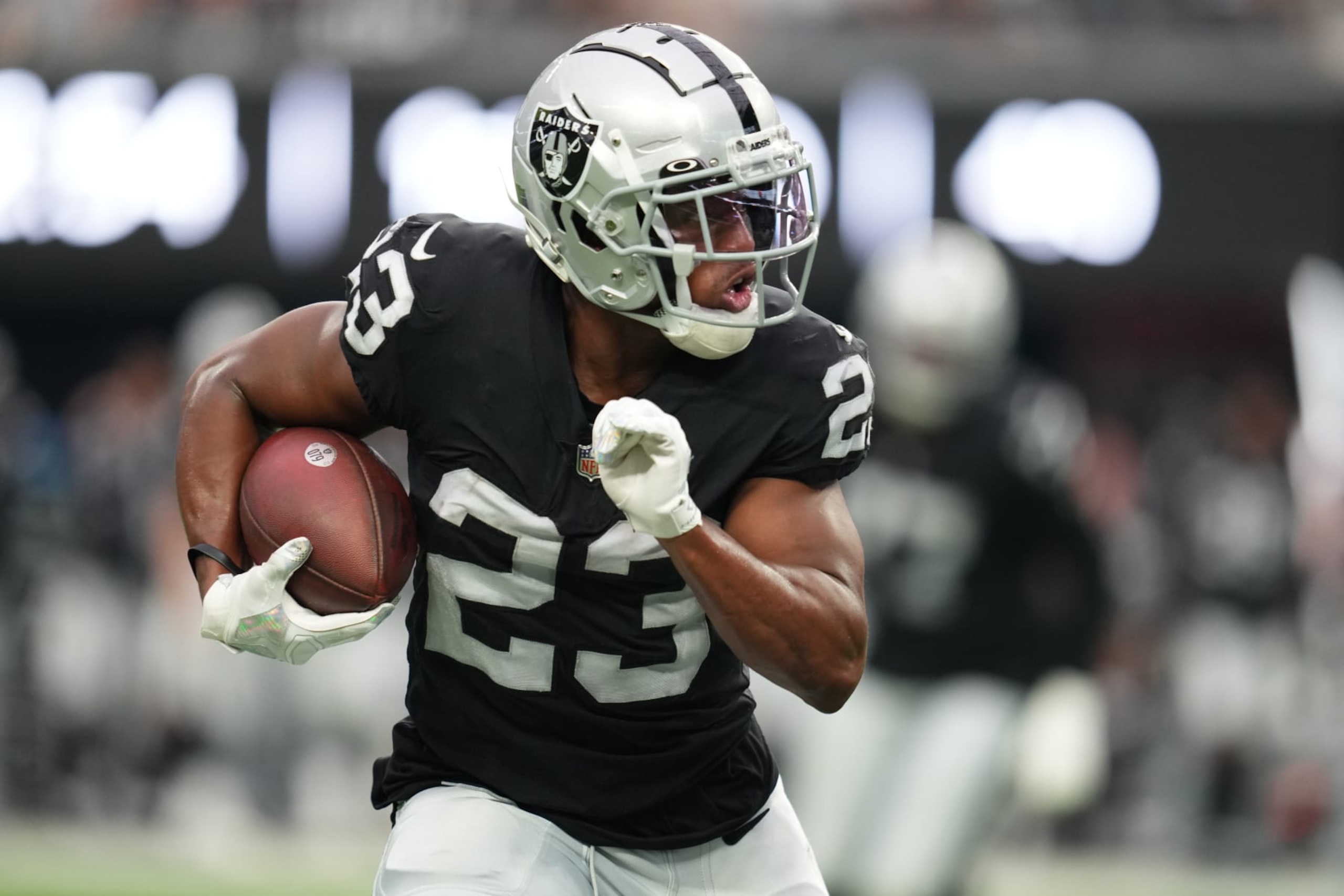LAS VEGAS, NEVADA - AUGUST 14: Running back Kenyan Drake #23 of the Las Vegas Raiders runs against the Minnesota Vikings during the first half of a preseason game at Allegiant Stadium on August 14, 2022 in Las Vegas, Nevada. (Photo by Chris Unger/Getty Images) LAS VEGAS, NEVADA - AUGUST 14: Running back Kenyan Drake #23 of the Las Vegas Raiders runs against the Minnesota Vikings during the first half of a preseason game at Allegiant Stadium on August 14, 2022 in Las Vegas, Nevada. (Photo by Chris Unger/Getty Images)