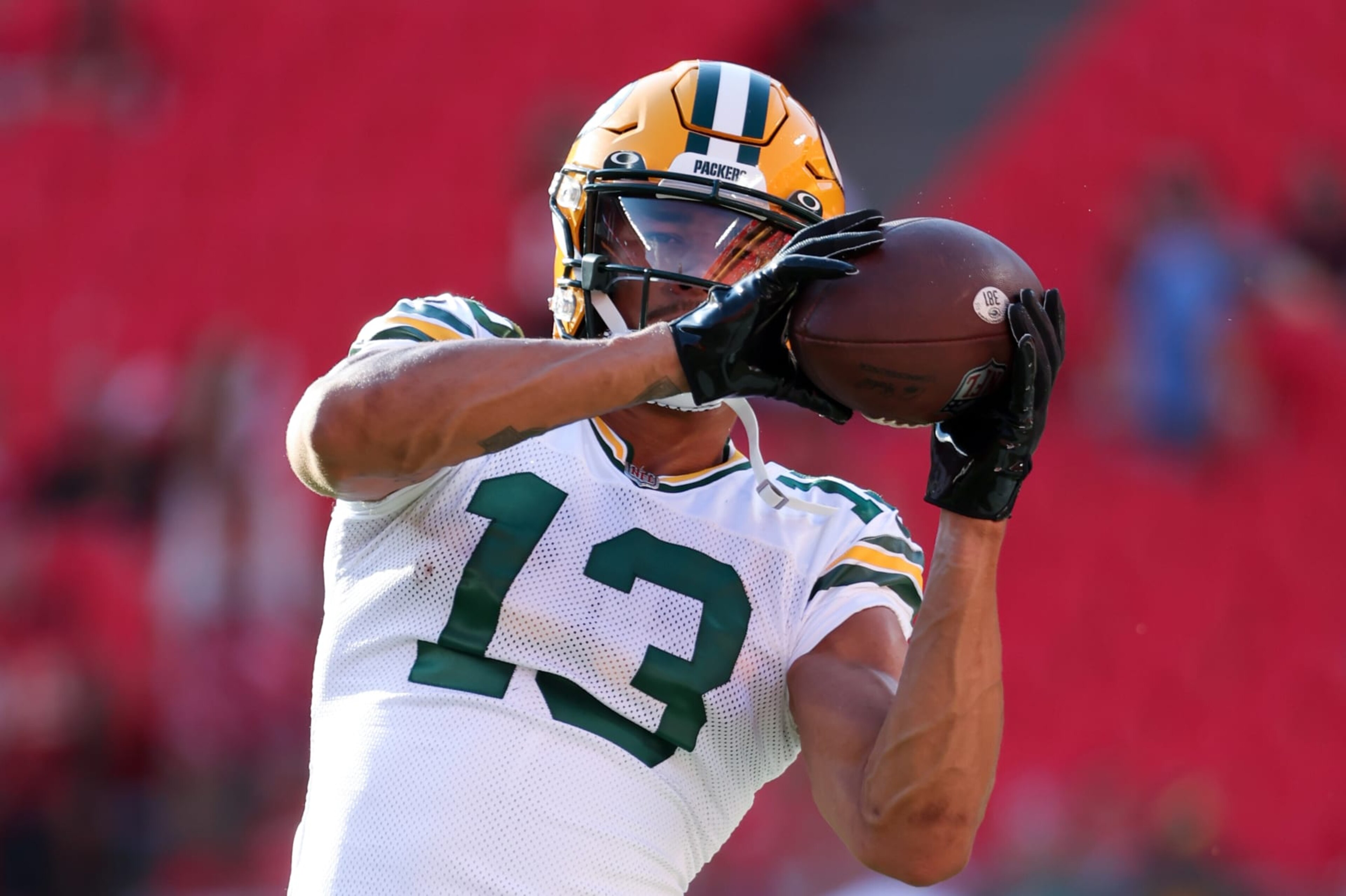 KANSAS CITY, MO - AUGUST 25: Green Bay Packers wide receiver Allen Lazard (13) catches a pass before an NFL preseason game between the Green Bay Packers and Kansas City Chiefs on August 25, 2022 at GEHA Field at Arrowhead Stadium in Kansas City, MO. (Photo by Scott Winters/Icon Sportswire via Getty Images)