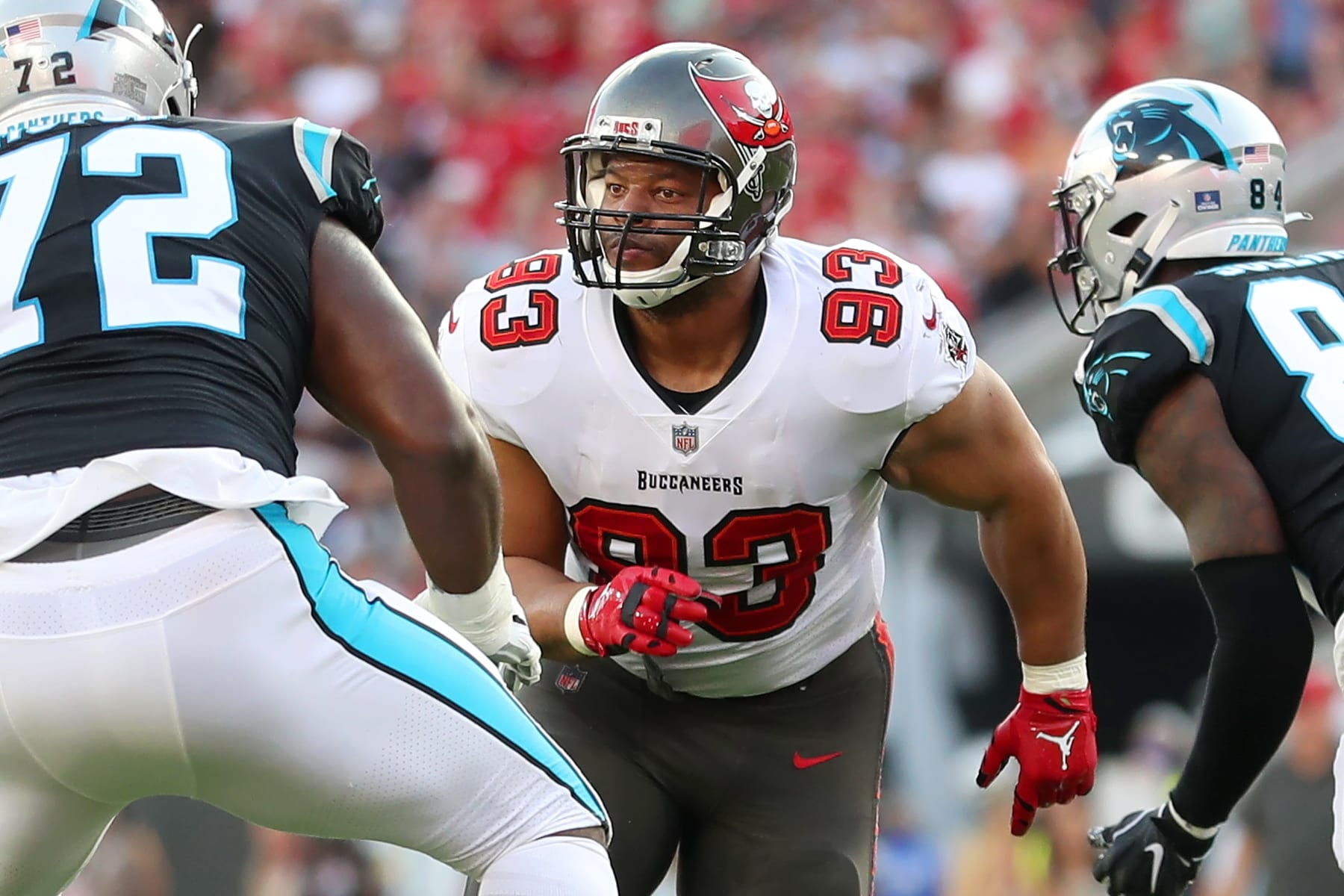 TAMPA, FL - JANUARY 9: Tampa Bay Buccaneers Defensive End Ndamukong Suh (93) rushes the passer during the regular season game between the Carolina Panthers and the Tampa Bay Buccaneers on January 9, 2022 at Raymond James Stadium in Tampa, Florida. (Photo by Cliff Welch/Icon Sportswire via Getty Images)