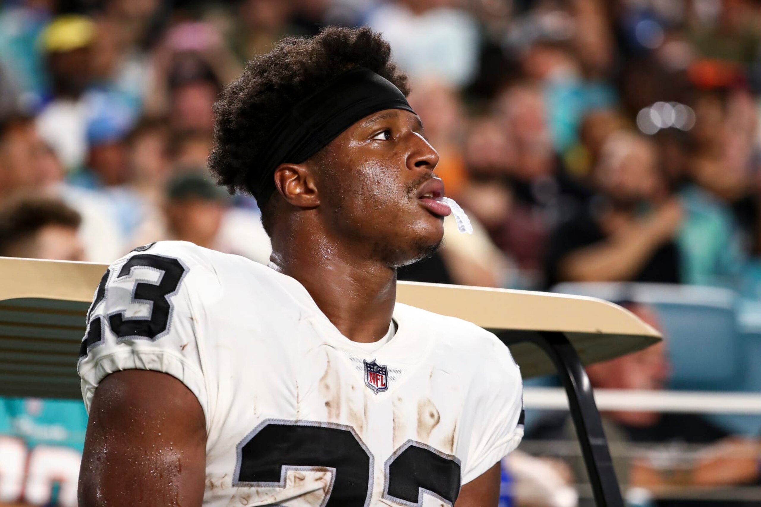 MIAMI GARDENS, FL - AUGUST 20: Kenyan Drake #23 of the Las Vegas Raiders looks on during a preseason NFL football game against the Miami Dolphins at Hard Rock Stadium on August 20, 2022 in Miami Gardens, Florida. (Photo by Kevin Sabitus/Getty Images)
