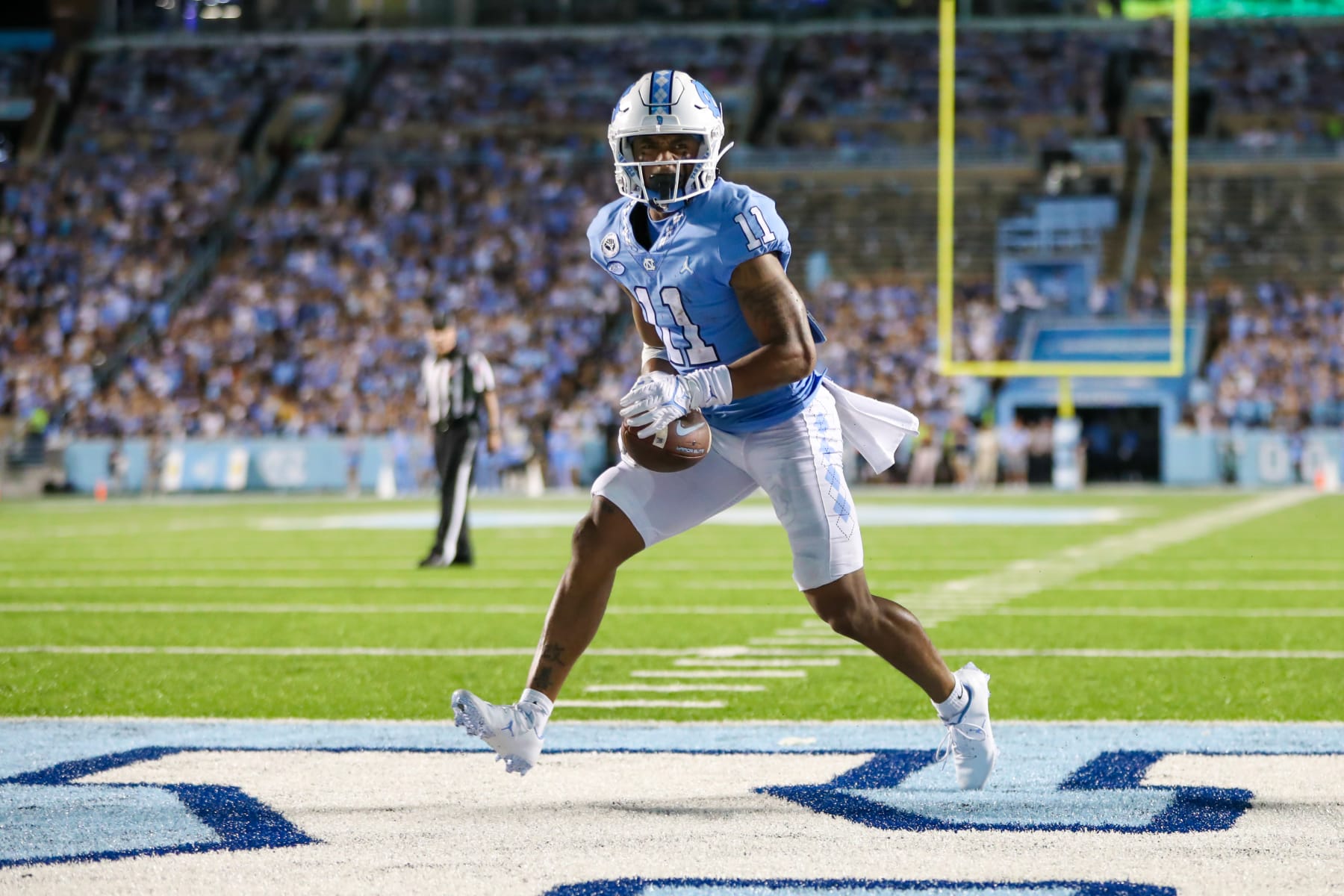 CHAPEL HILL, NC - AUGUST 27: Josh Downs (11) of the North Carolina Tar Heels reacts to the whistle being blown just before scoring a touchdown during a football game between the North Carolina Tar Heels and the Florida A&M Rattlers on August 27, 2022, at Kenan Memorial Stadium in Chapel Hill, NC. (Photo by David Jensen/Icon Sportswire via Getty Images)