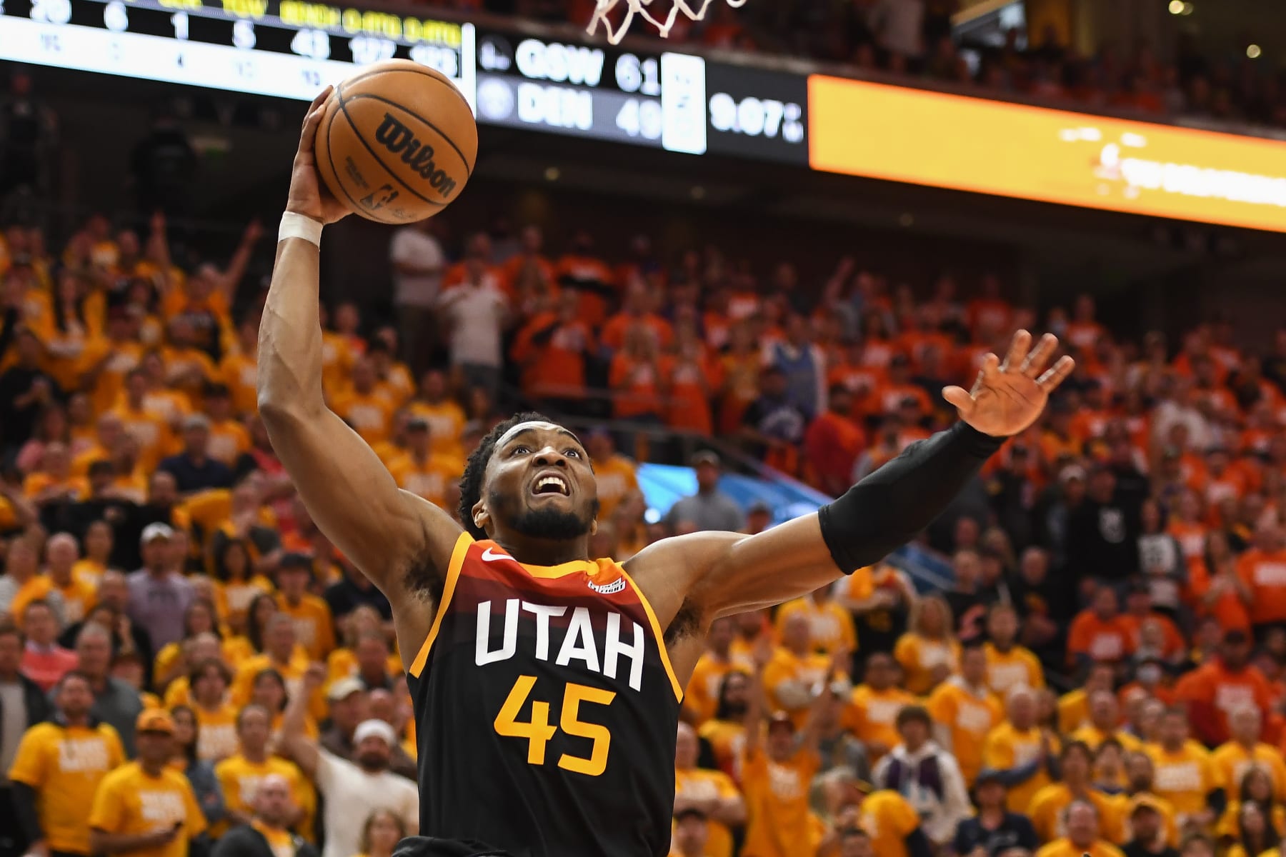 SALT LAKE CITY, UTAH - APRIL 21: Donovan Mitchell #45 of the Utah Jazz dunks during the second half of Game Three of the Western Conference First Round Playoffs against the Dallas Mavericks at Vivint Smart Home Arena on April 21, 2022 in Salt Lake City, Utah. NOTE TO USER: User expressly acknowledges and agrees that, by downloading and/or using this Photograph, user is consenting to the terms and conditions of the Getty Images License Agreement. (Photo by Alex Goodlett/Getty Images)