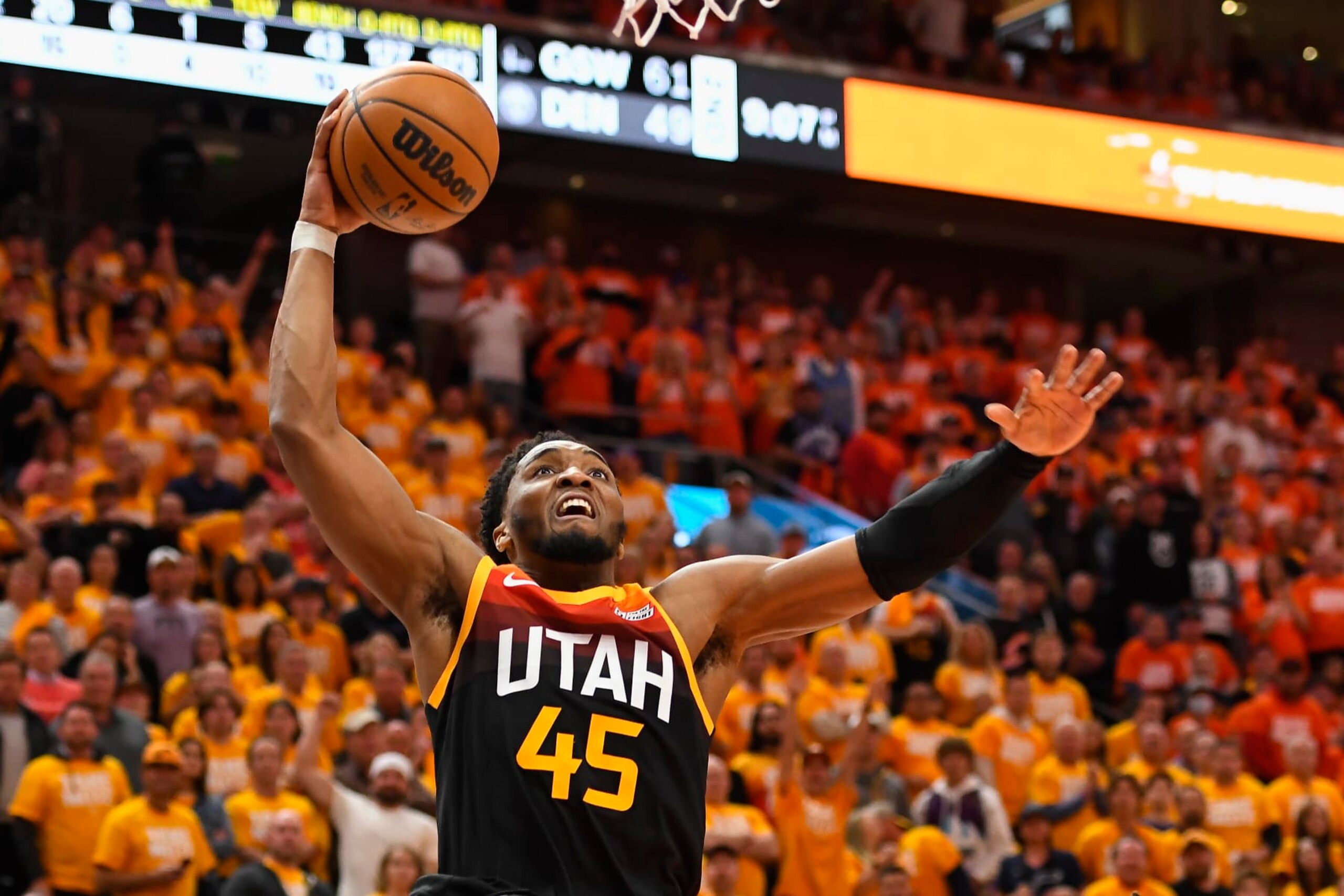 SALT LAKE CITY, UTAH - APRIL 21: Donovan Mitchell #45 of the Utah Jazz dunks during the second half of Game Three of the Western Conference First Round Playoffs against the Dallas Mavericks at Vivint Smart Home Arena on April 21, 2022 in Salt Lake City, Utah. NOTE TO USER: User expressly acknowledges and agrees that, by downloading and/or using this Photograph, user is consenting to the terms and conditions of the Getty Images License Agreement. (Photo by Alex Goodlett/Getty Images)