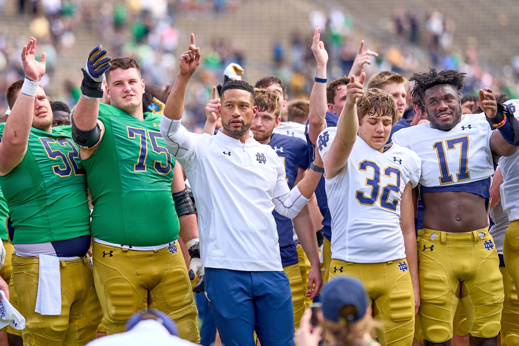 SOUTH BEND, IN - APRIL 23: Notre Dame Fighting Irish head coach Marcus Freeman celebrates with players after the Notre Dame Blue-Gold Spring Football Game on April 23, 2022 at Notre Dame Stadium in South Bend, IN. (Photo by Robin Alam/Icon Sportswire via Getty Images)