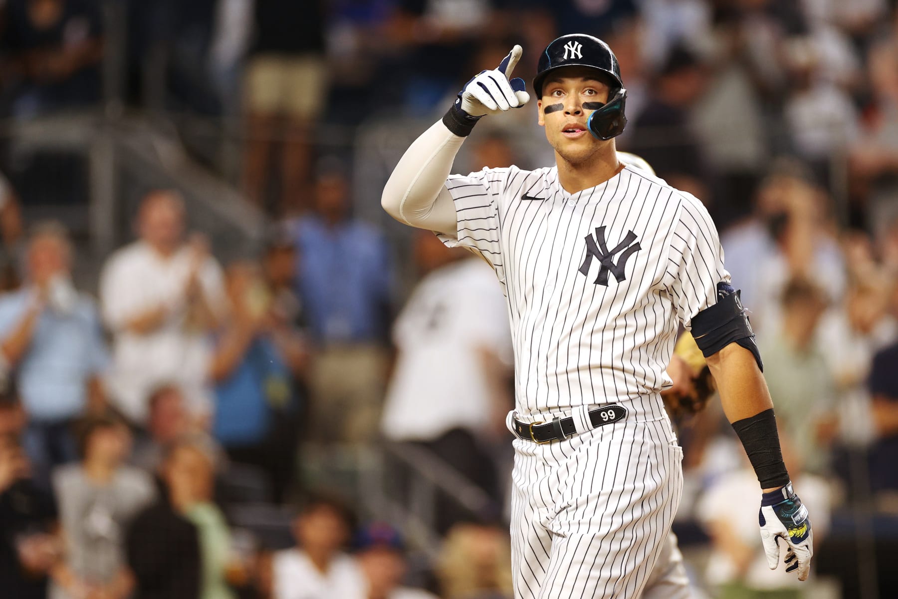 NEW YORK, NEW YORK - AUGUST 22: Aaron Judge #99 of the New York Yankees reacts after hitting a home run during the third inning against the New York Mets at Yankee Stadium on August 22, 2022 in the Bronx borough of New York City. (Photo by Sarah Stier/Getty Images)