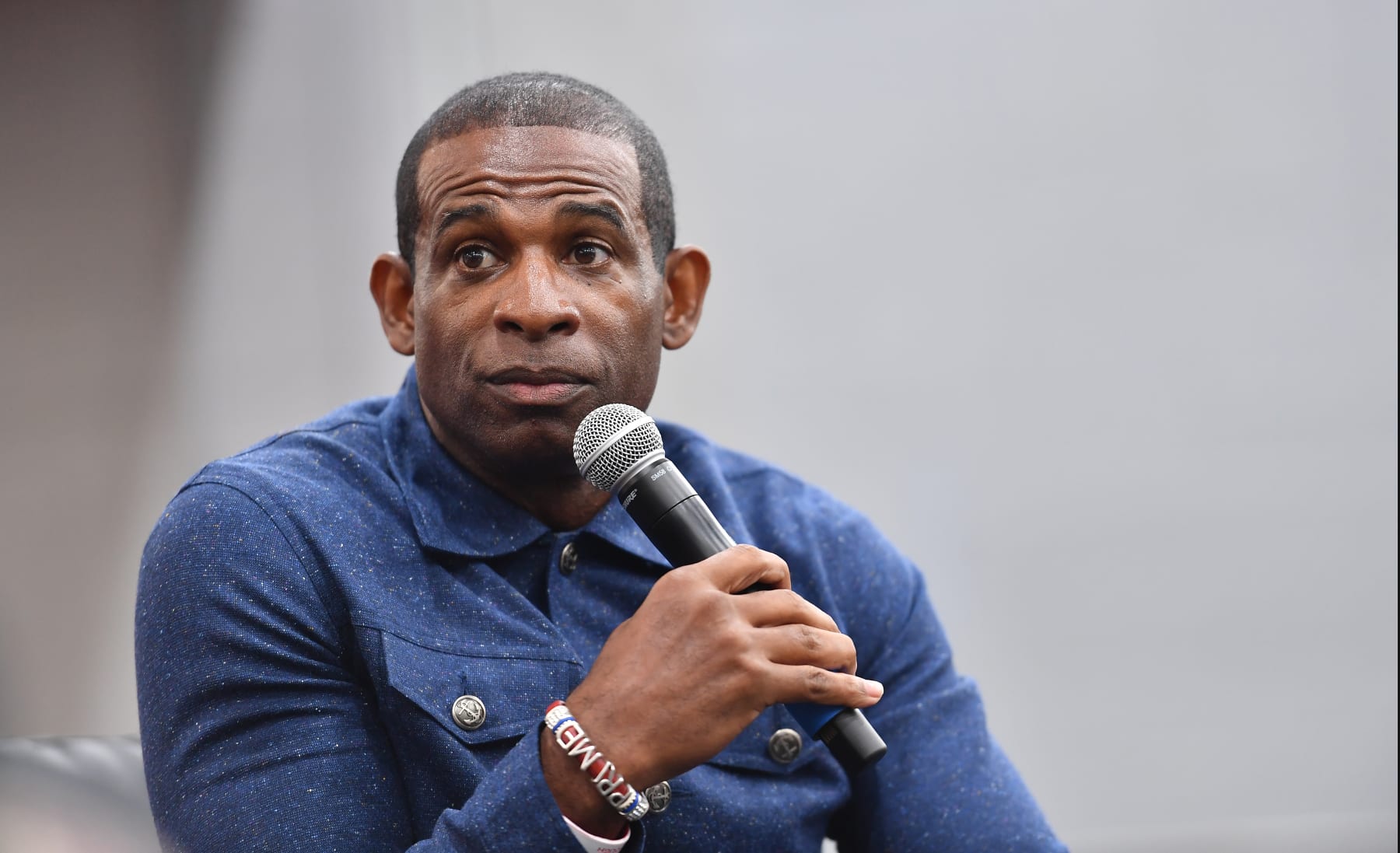 ATLANTA, GEORGIA - JUNE 17:  Deion Sanders speaks onstage during The Big Homecoming Event at Clark Atlanta University on June 17, 2022 in Atlanta, Georgia. (Photo by Paras Griffin/Getty Images)