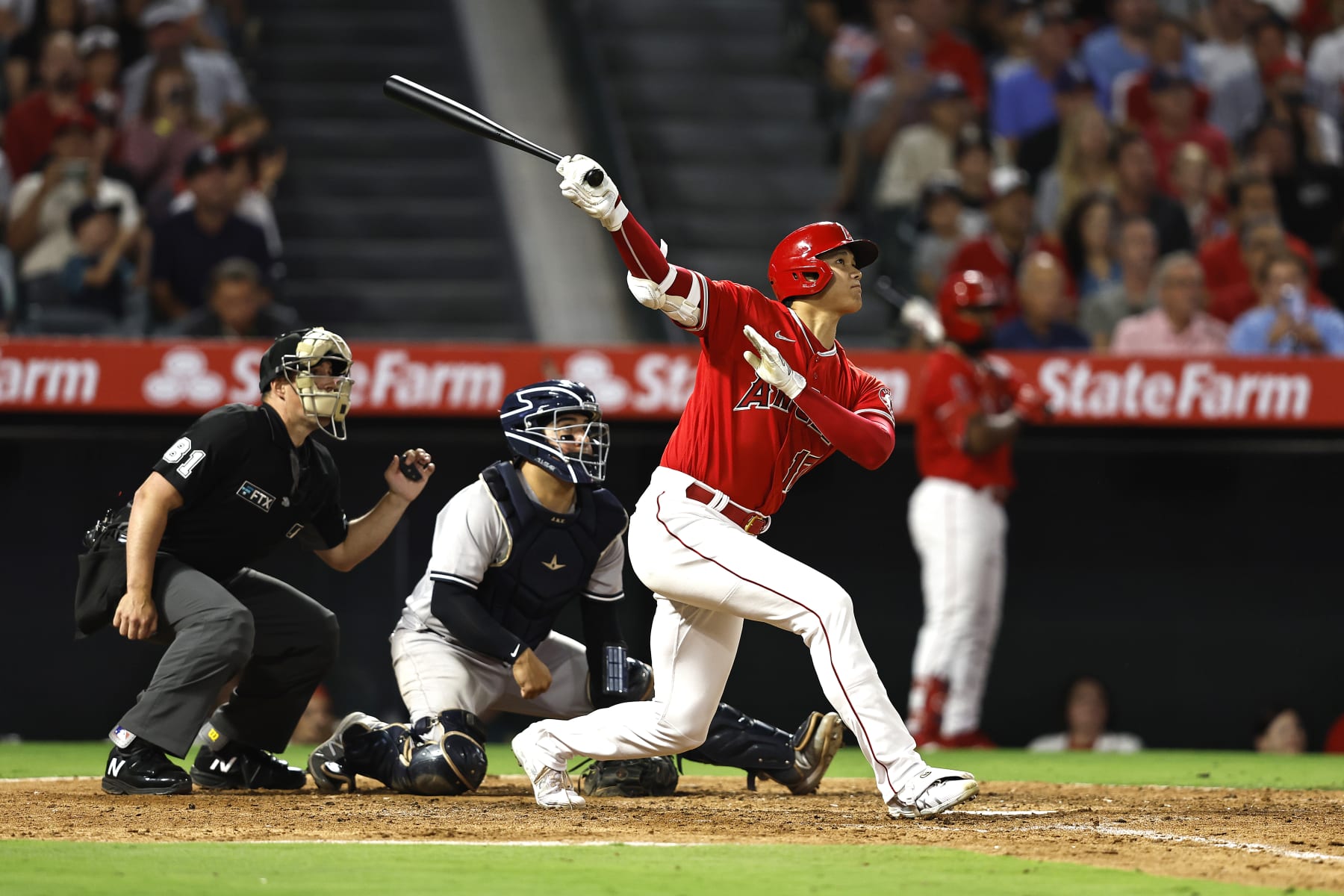 ANAHEIM, CALIFORNIA - AUGUST 29: Shohei Ohtani #17 of the Los Angeles Angels hits a two-run home run against the New York Yankees during the fifth inning at Angel Stadium of Anaheim on August 29, 2022 in Anaheim, California. (Photo by Michael Owens/Getty Images)