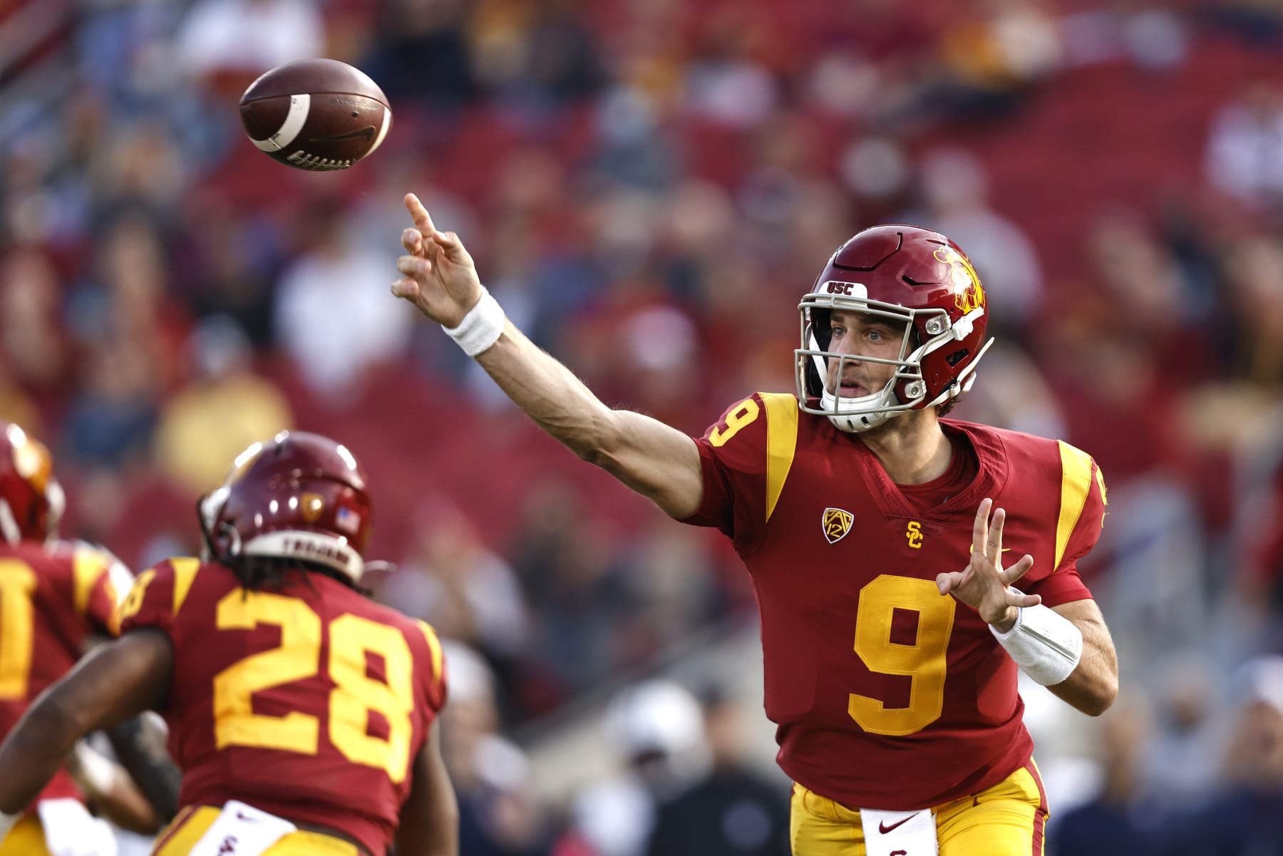 LOS ANGELES, CALIFORNIA - OCTOBER 30: Kedon Slovis #9 of the USC Trojans passes against the Arizona Wildcats during the first quarter at Los Angeles Memorial Coliseum on October 30, 2021 in Los Angeles, California. (Photo by Michael Owens/Getty Images)