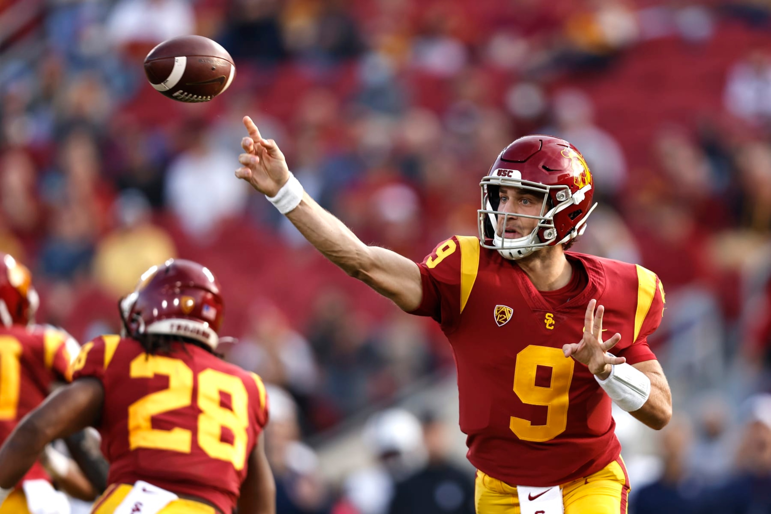LOS ANGELES, CALIFORNIA - OCTOBER 30: Kedon Slovis #9 of the USC Trojans passes against the Arizona Wildcats during the first quarter at Los Angeles Memorial Coliseum on October 30, 2021 in Los Angeles, California. (Photo by Michael Owens/Getty Images) LOS ANGELES, CALIFORNIA - OCTOBER 30: Kedon Slovis #9 of the USC Trojans passes against the Arizona Wildcats during the first quarter at Los Angeles Memorial Coliseum on October 30, 2021 in Los Angeles, California. (Photo by Michael Owens/Getty Images)