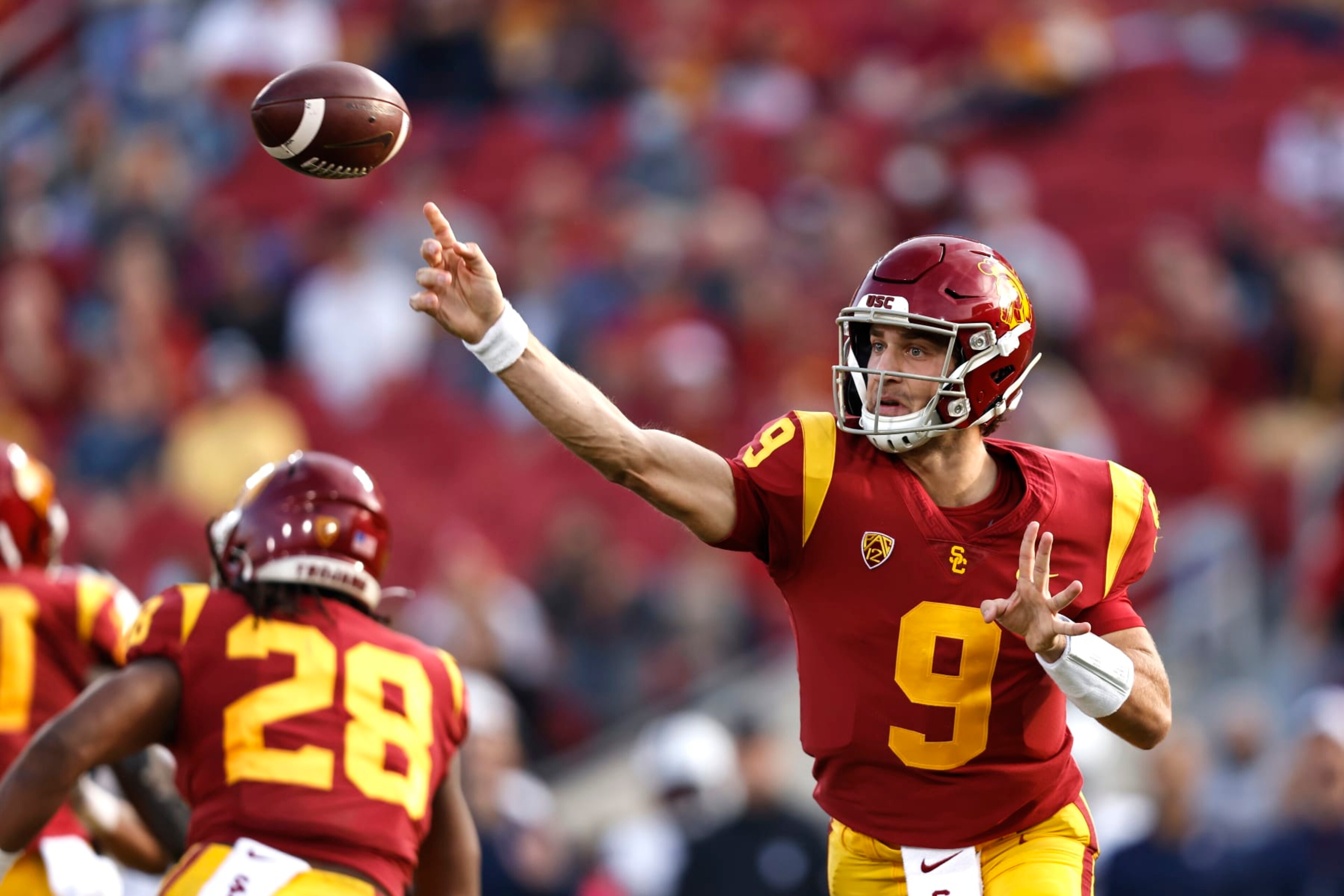LOS ANGELES, CALIFORNIA - OCTOBER 30: Kedon Slovis #9 of the USC Trojans passes against the Arizona Wildcats during the first quarter at Los Angeles Memorial Coliseum on October 30, 2021 in Los Angeles, California. (Photo by Michael Owens/Getty Images)