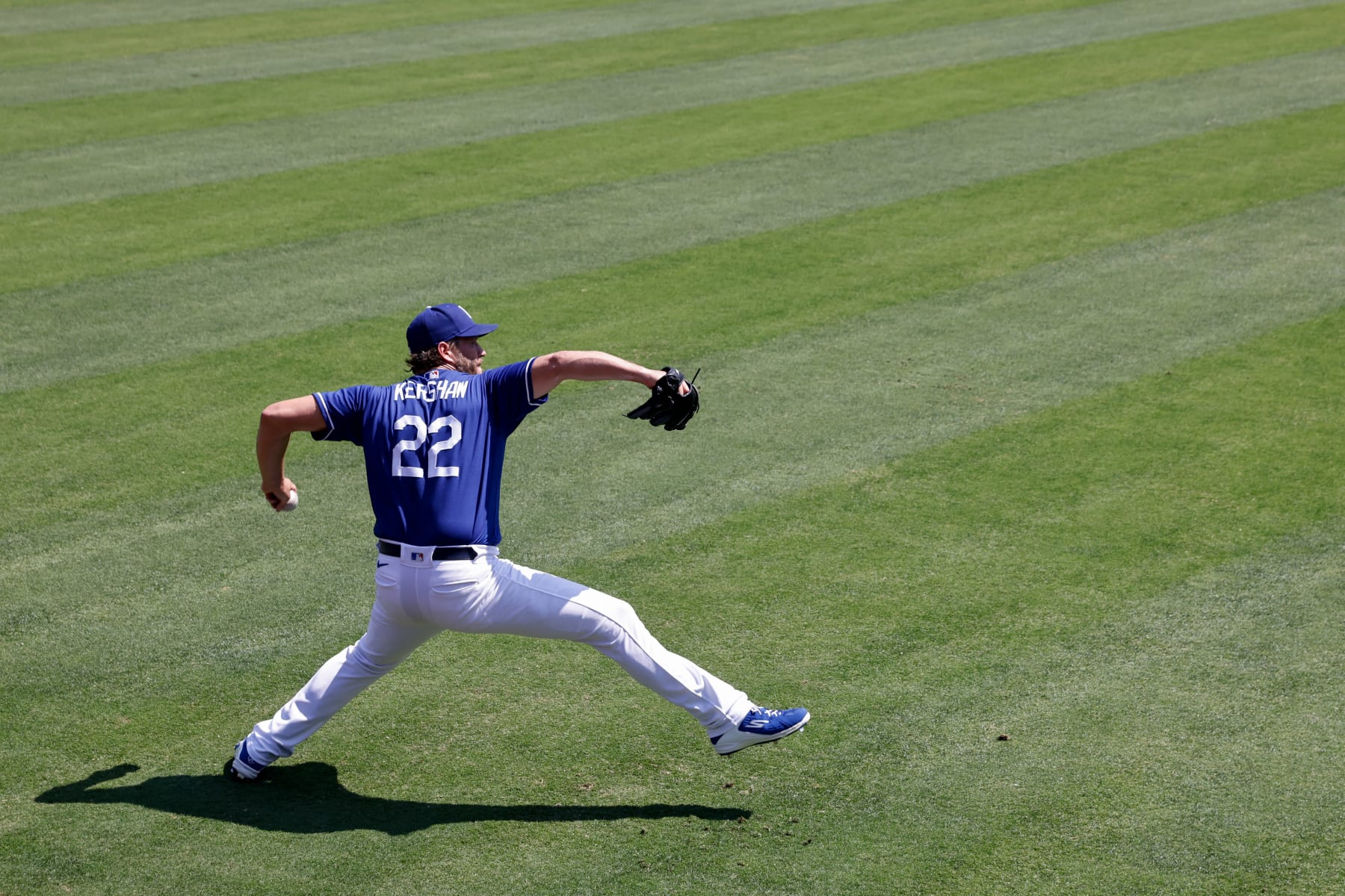 LOS ANGELES, CA - AUGUST 24:  Clayton Kershaw #22 of the Los Angeles Dodgers pitches before the game between the Milwaukee Brewers and the Los Angeles Dodgers at Dodgers Stadium on Wednesday, August 24, 2022 in Los Angeles, California. (Photo by Michael Owens/MLB Photos via Getty Images)