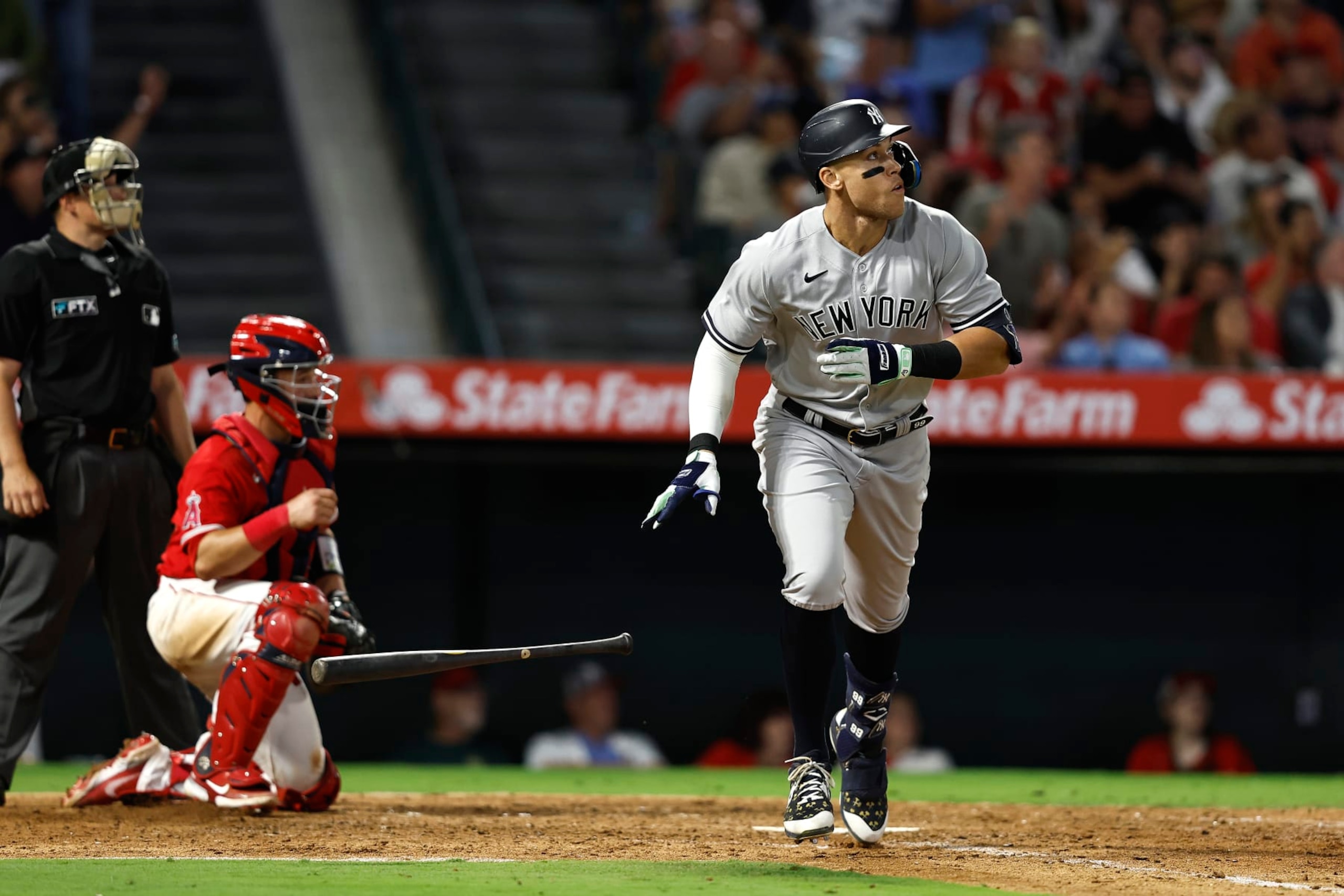 ANAHEIM, CALIFORNIA - AUGUST 29: Aaron Judge #99 of the New York Yankees hits his 50th home run against the Los Angeles Angels during the eighth inning at Angel Stadium of Anaheim on August 29, 2022 in Anaheim, California. (Photo by Michael Owens/Getty Images)