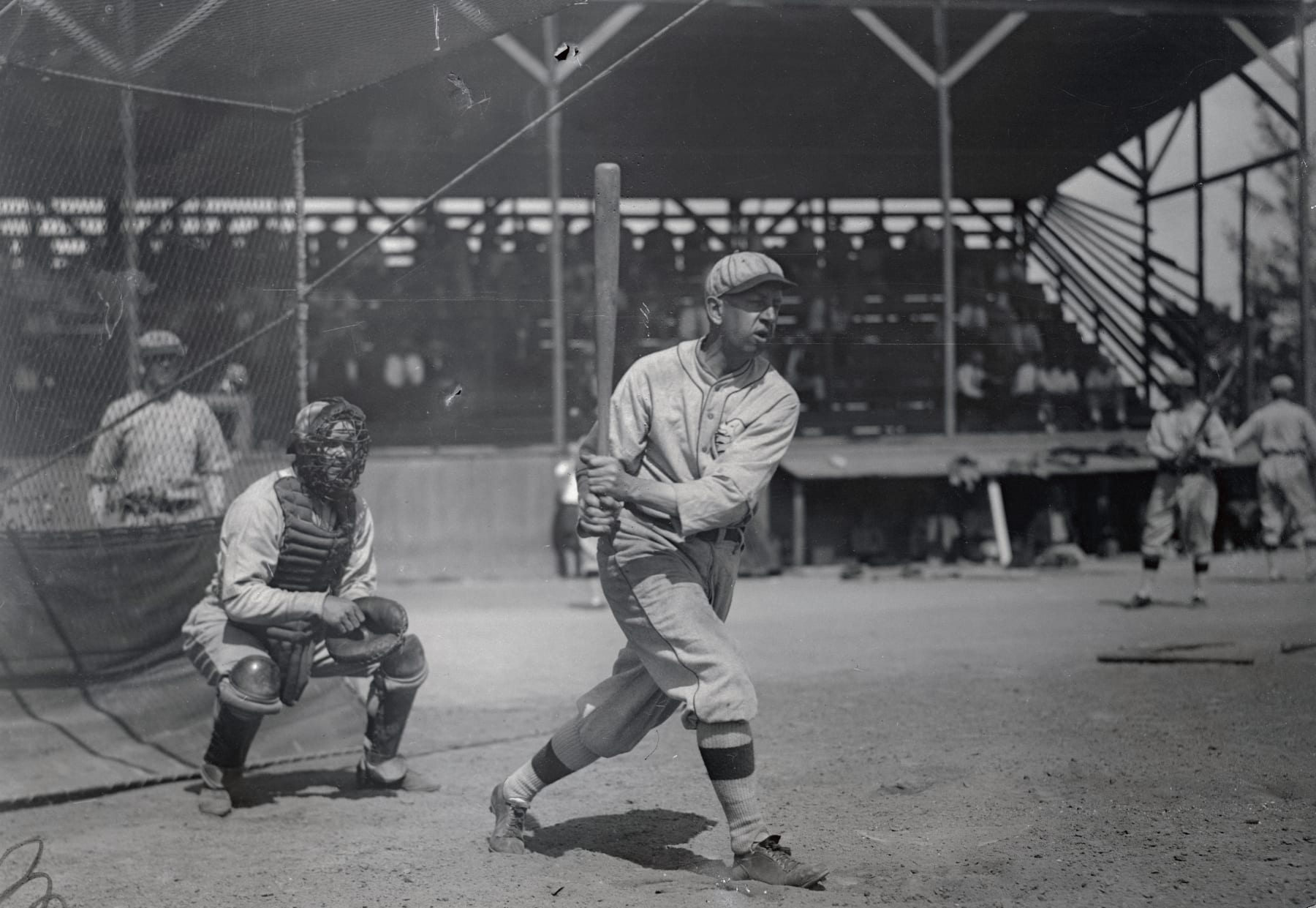 (Original Caption) After ten years with the Chicago White Sox, Eddie Collins, veteran second baseman, will again play with the team he made his debut in baseball back in 1907. He is shown above after hitting the ball over the fence at the athletics Spring Training camp at Clearwater, Florida.