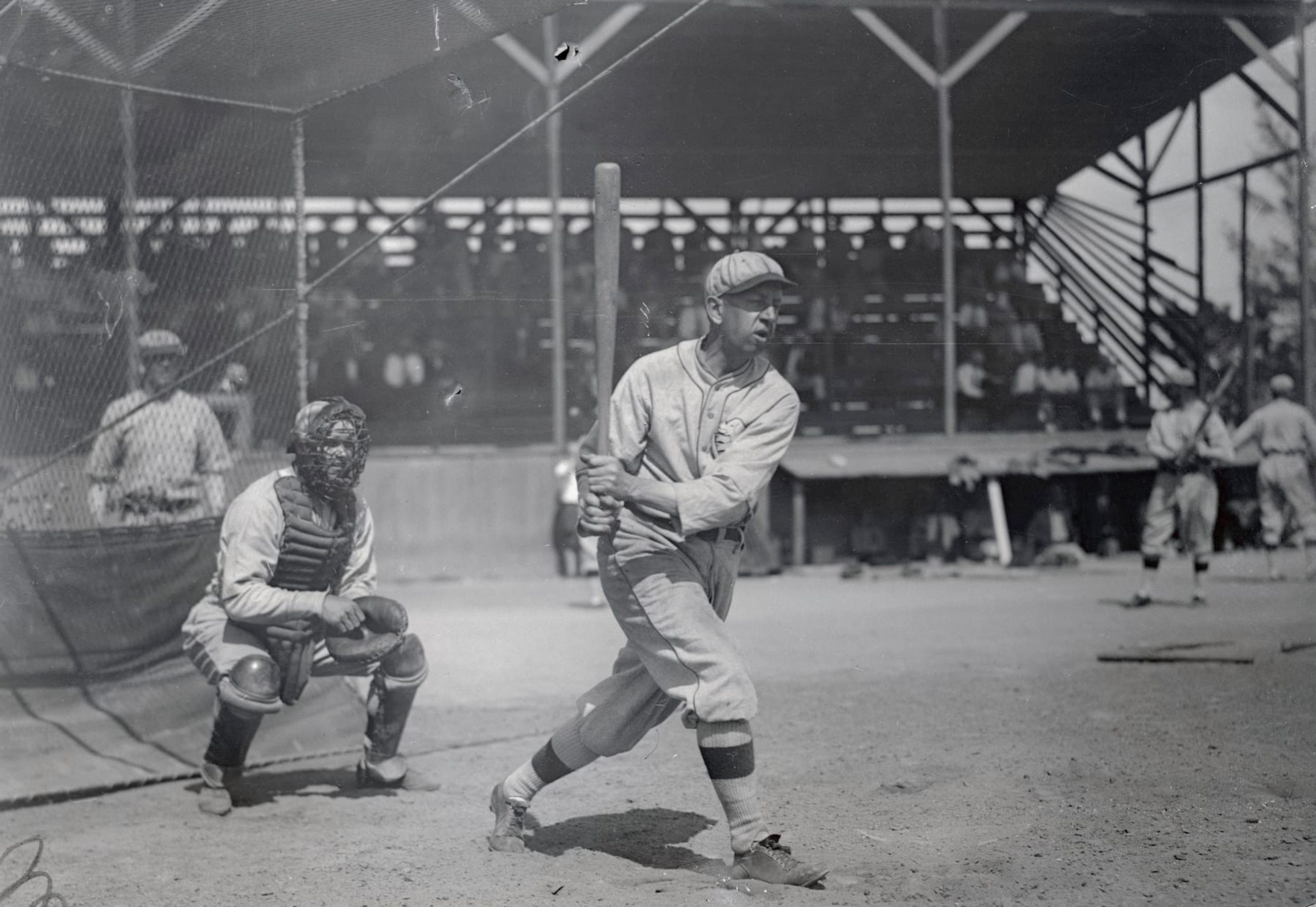 (Original Caption) After ten years with the Chicago White Sox, Eddie Collins, veteran second baseman, will again play with the team he made his debut in baseball back in 1907. He is shown above after hitting the ball over the fence at the athletics Spring Training camp at Clearwater, Florida.