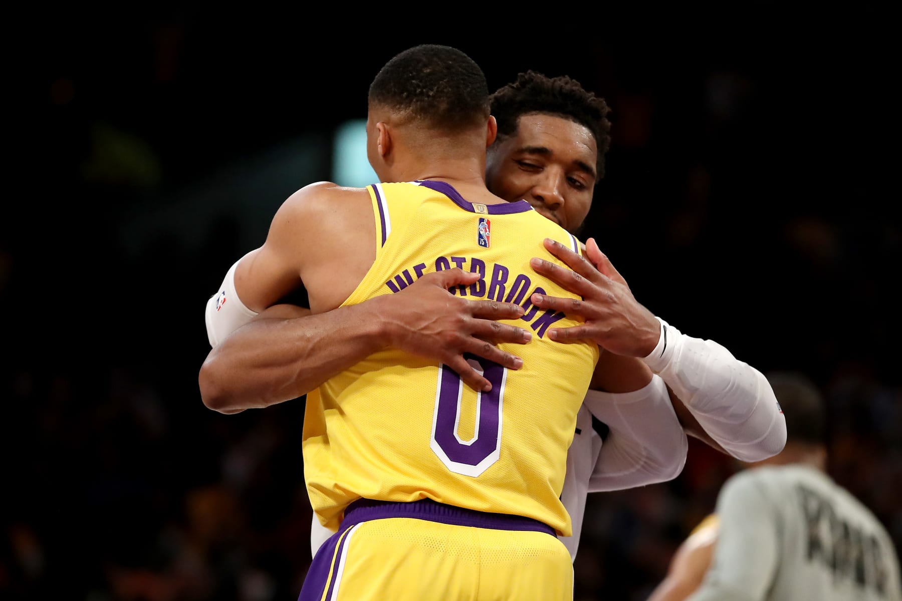 LOS ANGELES, CALIFORNIA - JANUARY 17: Donovan Mitchell #45 of the Utah Jazz and Russell Westbrook #0 of the Los Angeles Lakers hug after the game at Crypto.com Arena on January 17, 2022 in Los Angeles, California. NOTE TO USER: User expressly acknowledges and agrees that, by downloading and/or using this photograph, User is consenting to the terms and conditions of the Getty Images License Agreement. (Photo by Katelyn Mulcahy/Getty Images)