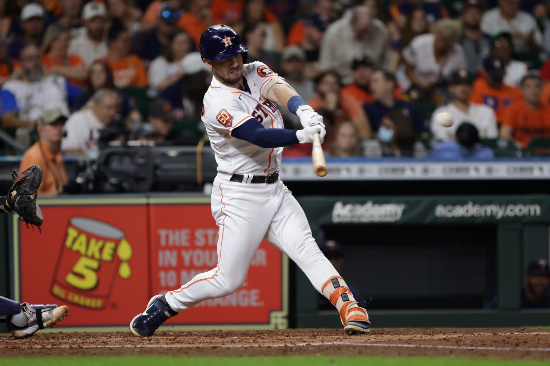 HOUSTON, TEXAS - AUGUST 25: Alex Bregman #2 of the Houston Astros doubles in the third inning against the Minnesota Twins at Minute Maid Park on August 25, 2022 in Houston, Texas. (Photo by Tim Warner/Getty Images)