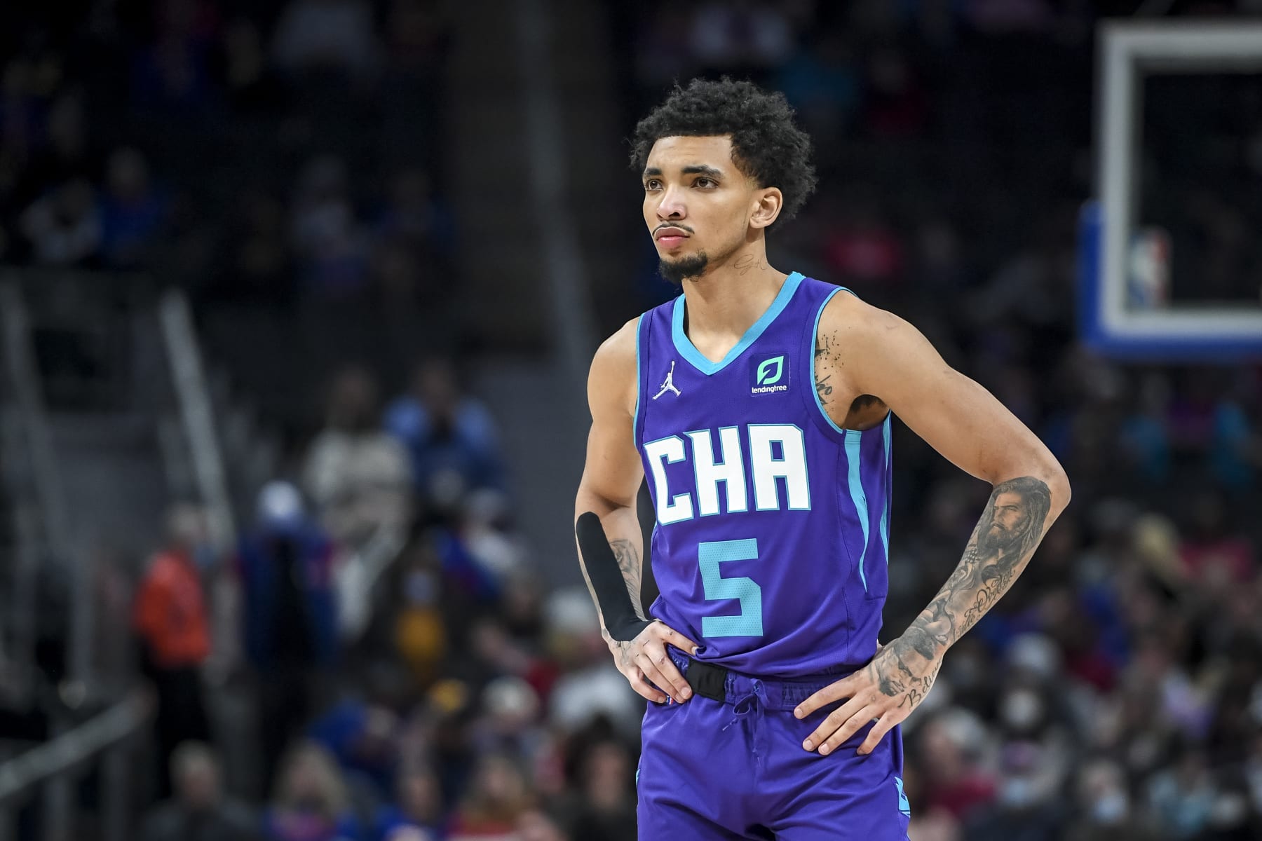 DETROIT, MICHIGAN - FEBRUARY 11: James Bouknight #5 of the Charlotte Hornets looks on against the Detroit Pistons during the first quarter at Little Caesars Arena on February 11, 2022 in Detroit, Michigan. NOTE TO USER: User expressly acknowledges and agrees that, by downloading and or using this photograph, User is consenting to the terms and conditions of the Getty Images License Agreement. (Photo by Nic Antaya/Getty Images