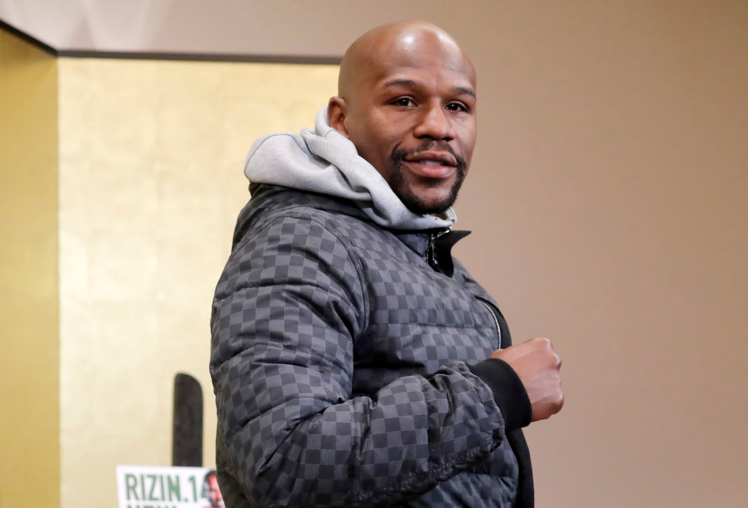 Floyd Mayweather Jr. poses for photographers during a news conference in Tokyo Saturday, Dec. 29, 2018. Mayweather is scheduled to fight Japanese kickboxer Tenshin Nasukawa in a three-round exhibition match in Japan on New Year's Eve. (AP Photo/Eugene Hoshiko) Floyd Mayweather Jr. poses for photographers during a news conference in Tokyo Saturday, Dec. 29, 2018. Mayweather is scheduled to fight Japanese kickboxer Tenshin Nasukawa in a three-round exhibition match in Japan on New Year's Eve. (AP Photo/Eugene Hoshiko)