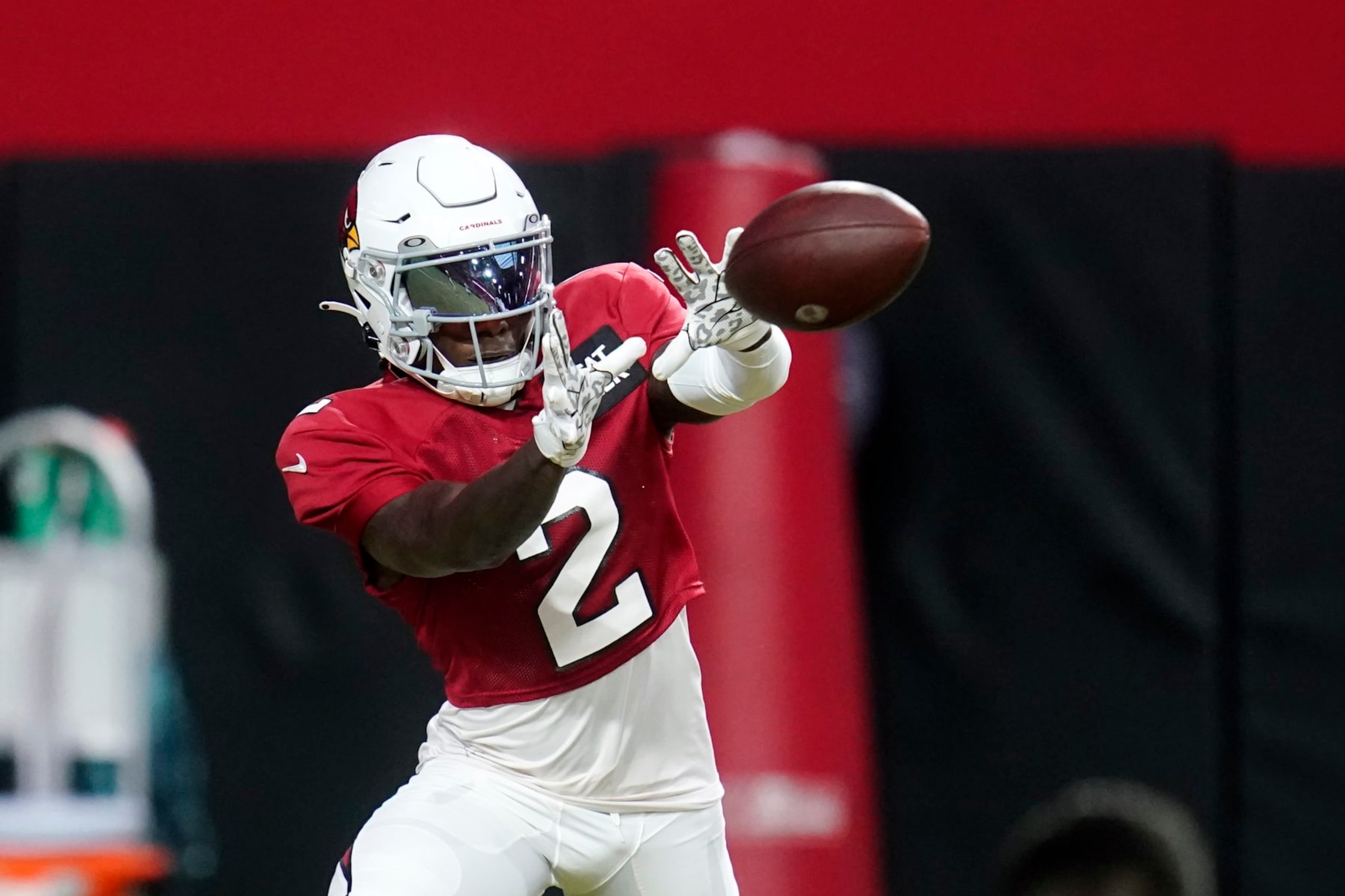 Arizona Cardinals wide receiver Marquise Brown reaches out to make a catch as he takes part in drills during the NFL football team's training camp at State Farm Stadium, Tuesday, Aug. 9, 2022, in Glendale, Ariz. (AP Photo/Ross D. Franklin)