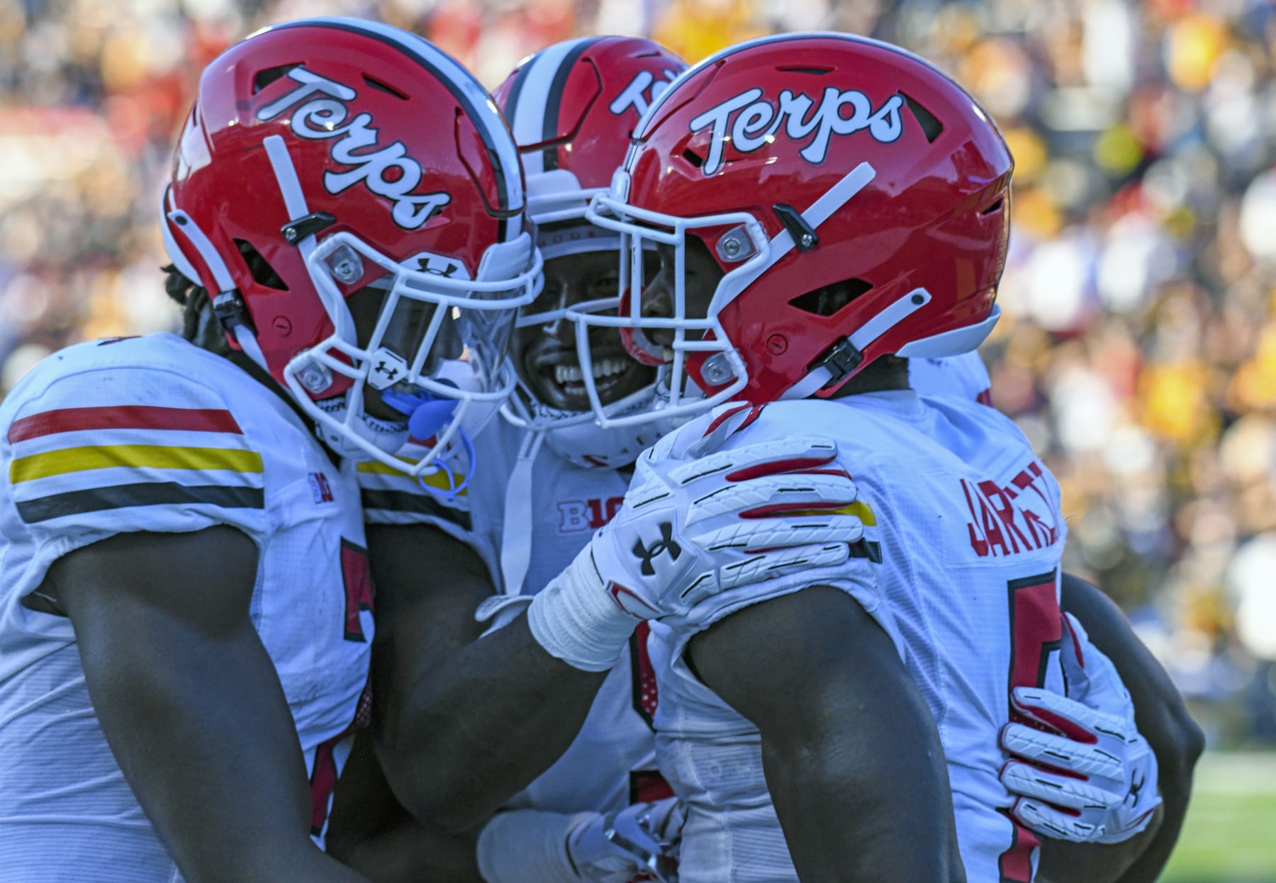 COLLEGE PARK, MD - SEPTEMBER 04: Maryland Terrapins wide receiver Rakim Jarrett (5) celebrates with wide receiver Dontay Demus Jr. (7) and tight end Chigoziem Okonkwo (9) after his 60 yard touchdown pass reception during the West Virginia Mountaineers game versus the Maryland Terrapins on September 4, 2021 at Capital One Field at Maryland Stadium in College Park, MD.  (Photo by Mark Goldman/Icon Sportswire via Getty Images)
