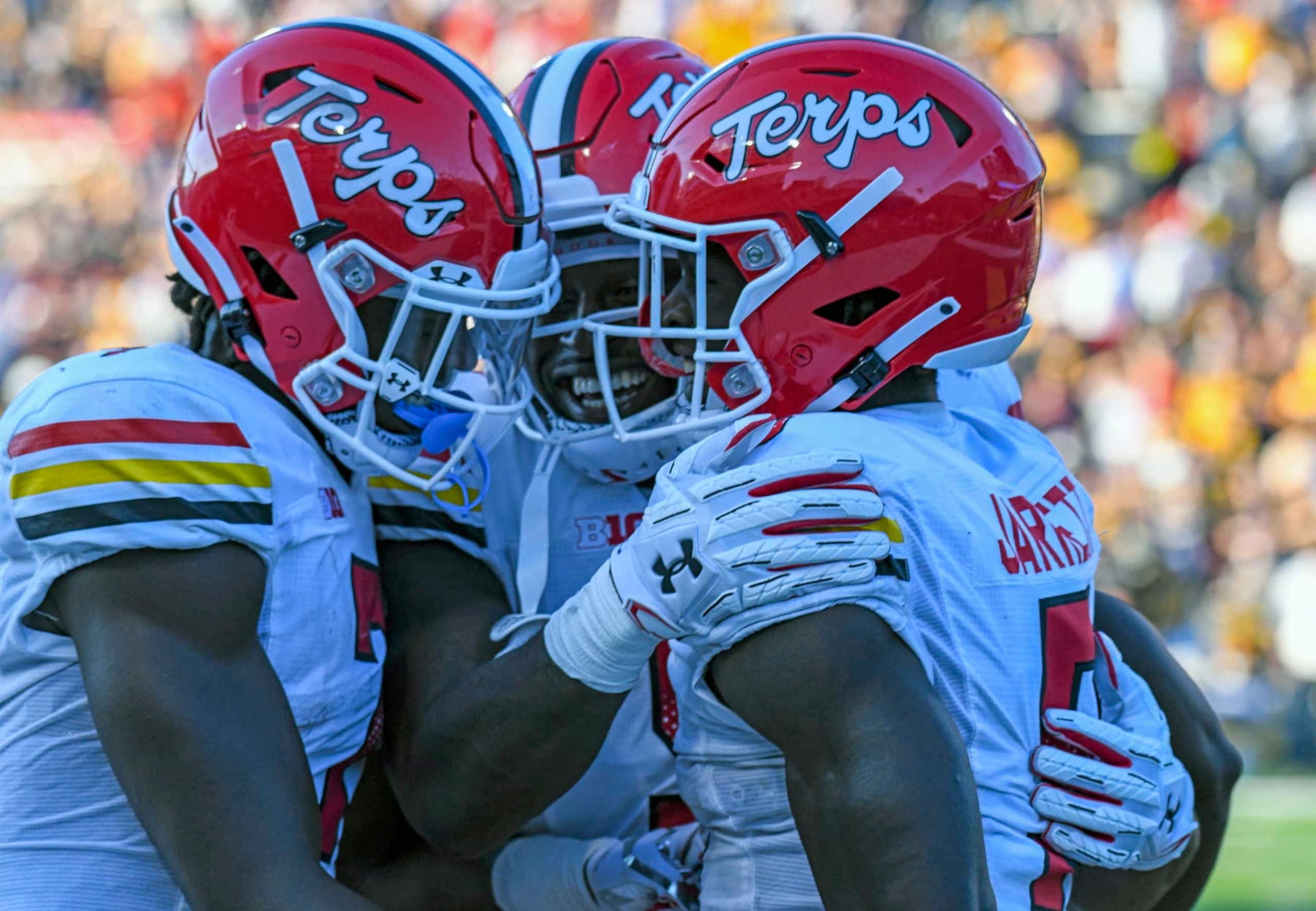 COLLEGE PARK, MD - SEPTEMBER 04: Maryland Terrapins wide receiver Rakim Jarrett (5) celebrates with wide receiver Dontay Demus Jr. (7) and tight end Chigoziem Okonkwo (9) after his 60 yard touchdown pass reception during the West Virginia Mountaineers game versus the Maryland Terrapins on September 4, 2021 at Capital One Field at Maryland Stadium in College Park, MD.  (Photo by Mark Goldman/Icon Sportswire via Getty Images)