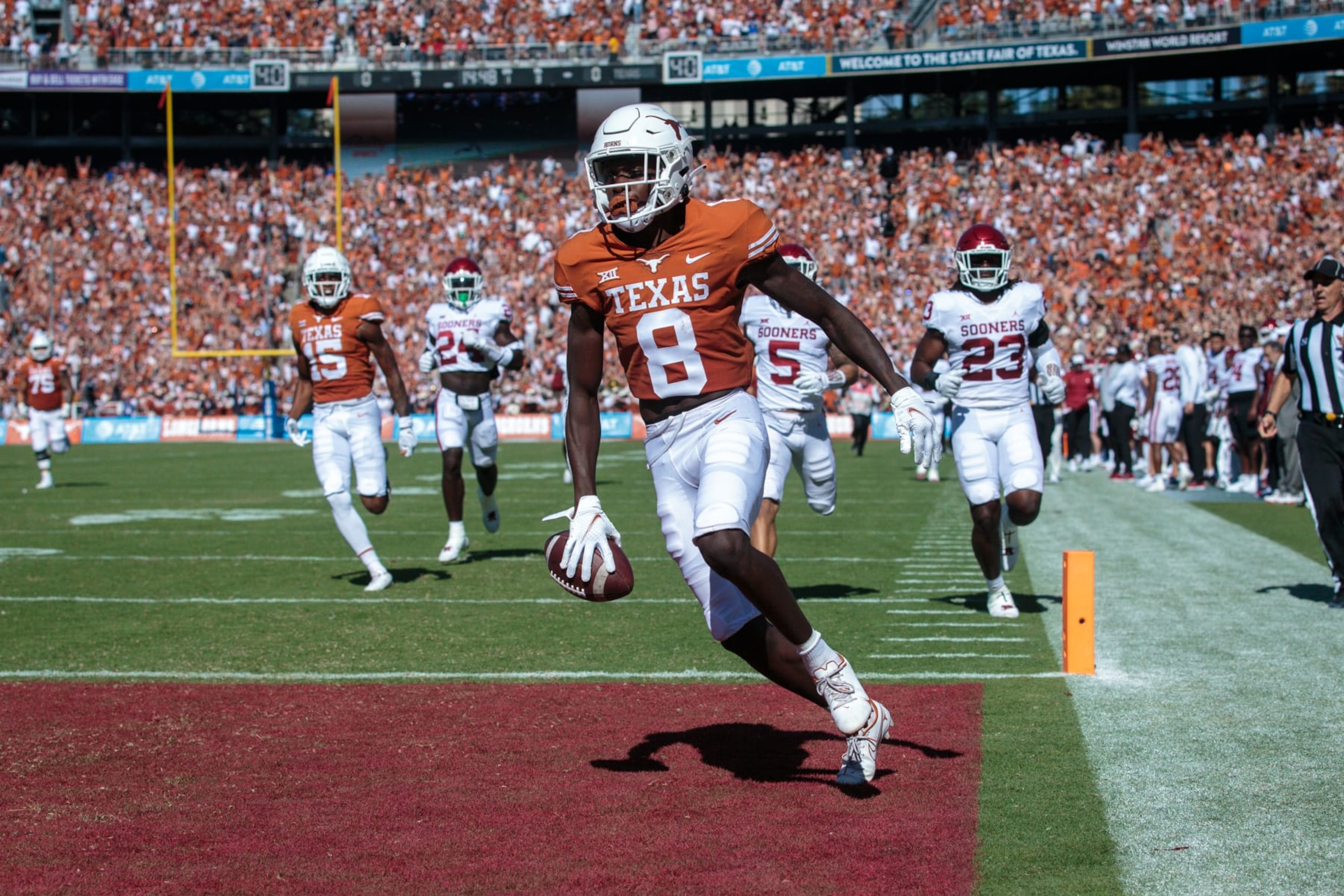 DALLAS, TX - OCTOBER 09: Texas Longhorns wide receiver Xavier Worthy (8) heads to the end zone on a kickoff run back against the Oklahoma Sooners on October 9th, 2021 at Cotton Bowl Stadium in Dallas, Texas. (Photo by William Purnell/Icon Sportswire via Getty Images)