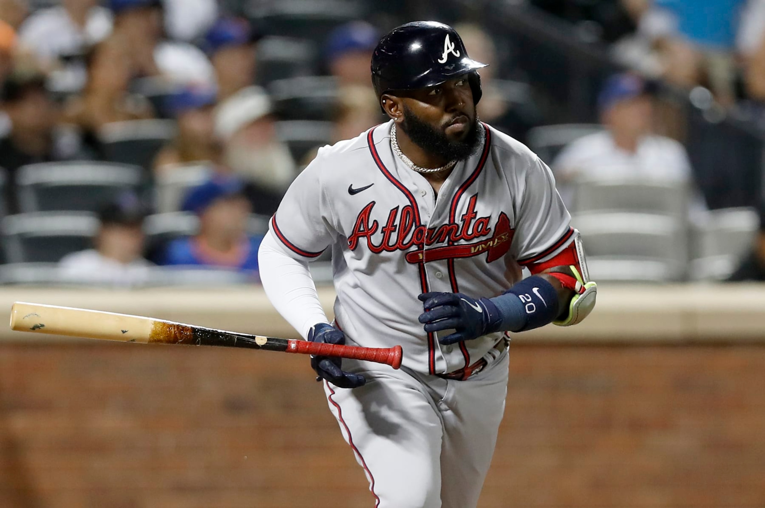 NEW YORK, NEW YORK - AUGUST 05:  Marcell Ozuna #20 of the Atlanta Braves in action against the New York Mets at Citi Field on August 05, 2022 in New York City. The Braves defeated the Mets 9-6. (Photo by Jim McIsaac/Getty Images)