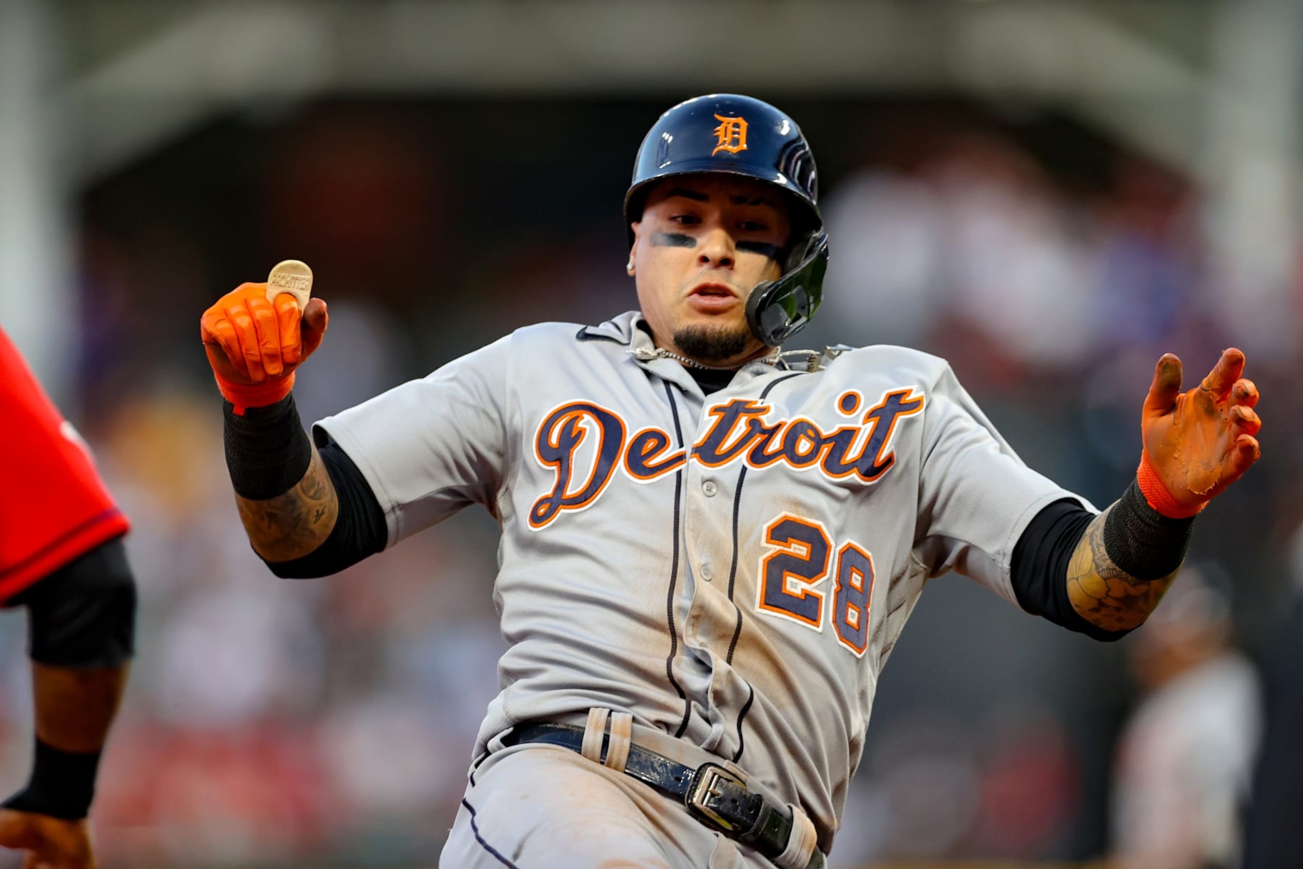 CLEVELAND, OH - AUGUST 17: Detroit Tigers shortstop Javier Baez (28) slides into third base as he advances on a sacrifice fly during the fourth inning of the Major League Baseball game between the Detroit Tigers and Cleveland Guardians on August 17, 2022, at Progressive Field in Cleveland, OH. (Photo by Frank Jansky/Icon Sportswire via Getty Images)
