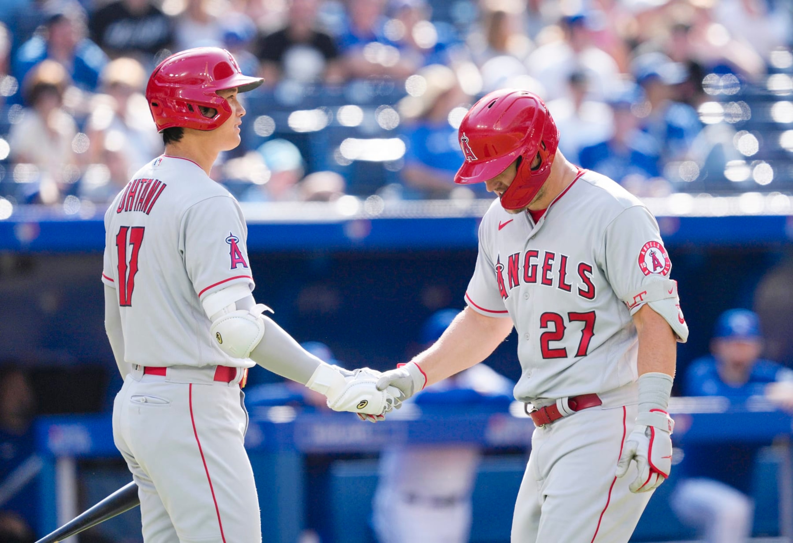 TORONTO, ON - AUGUST 28: Mike Trout #27 of the Los Angeles Angels celebrates his home run with Shohei Ohtani #17 against the Toronto Blue Jays in the ninth inning during their MLB game at the Rogers Centre on August 28, 2022 in Toronto, Ontario, Canada. (Photo by Mark Blinch/Getty Images)