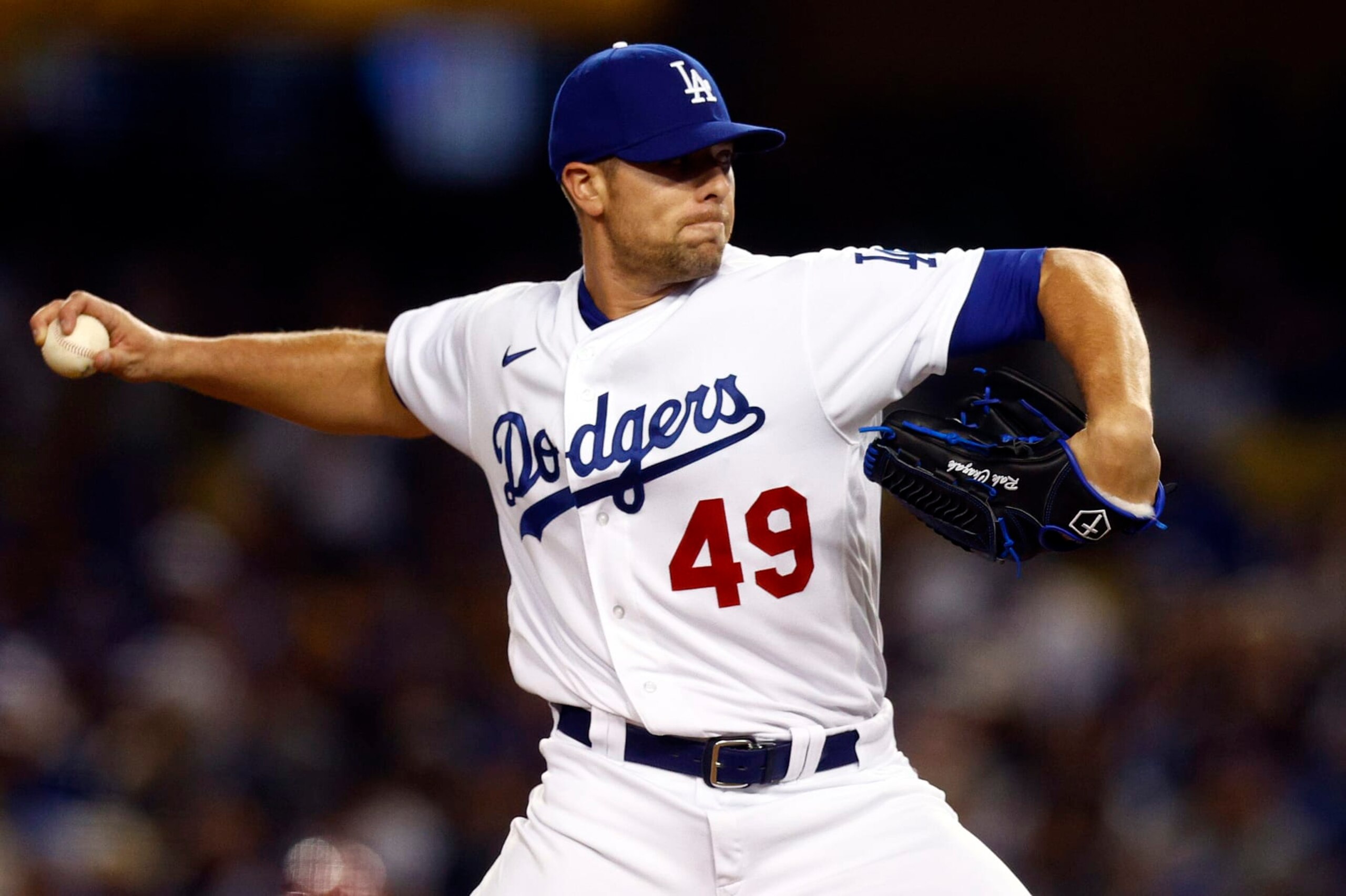 LOS ANGELES, CALIFORNIA - APRIL 14: Blake Treinen #49 of the Los Angeles Dodgers throws against the Cincinnati Reds in the eighth inning during the opening series at Dodger Stadium on April 14, 2022 in Los Angeles, California. (Photo by Ronald Martinez/Getty Images) LOS ANGELES, CALIFORNIA - APRIL 14: Blake Treinen #49 of the Los Angeles Dodgers throws against the Cincinnati Reds in the eighth inning during the opening series at Dodger Stadium on April 14, 2022 in Los Angeles, California. (Photo by Ronald Martinez/Getty Images)